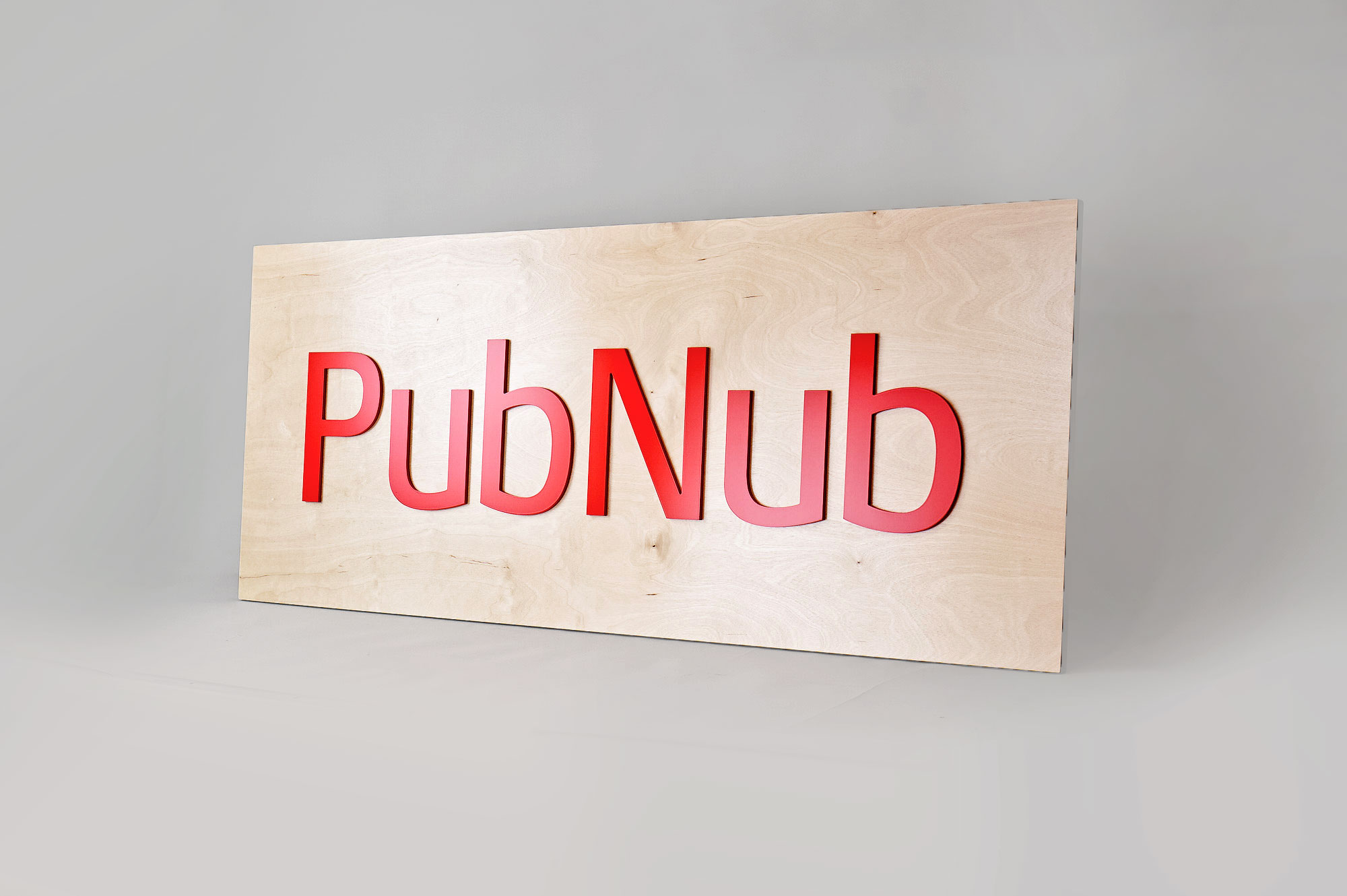 Light wood sign with red letters for PubNub, a global Data Stream Network and realtime infrastructure-as-a-service company based in San Francisco, California. Light wood sign with red letters for PubNub, a global Data Stream Network and realtime infrastructure-as-a-service company based in San Francisco, California.