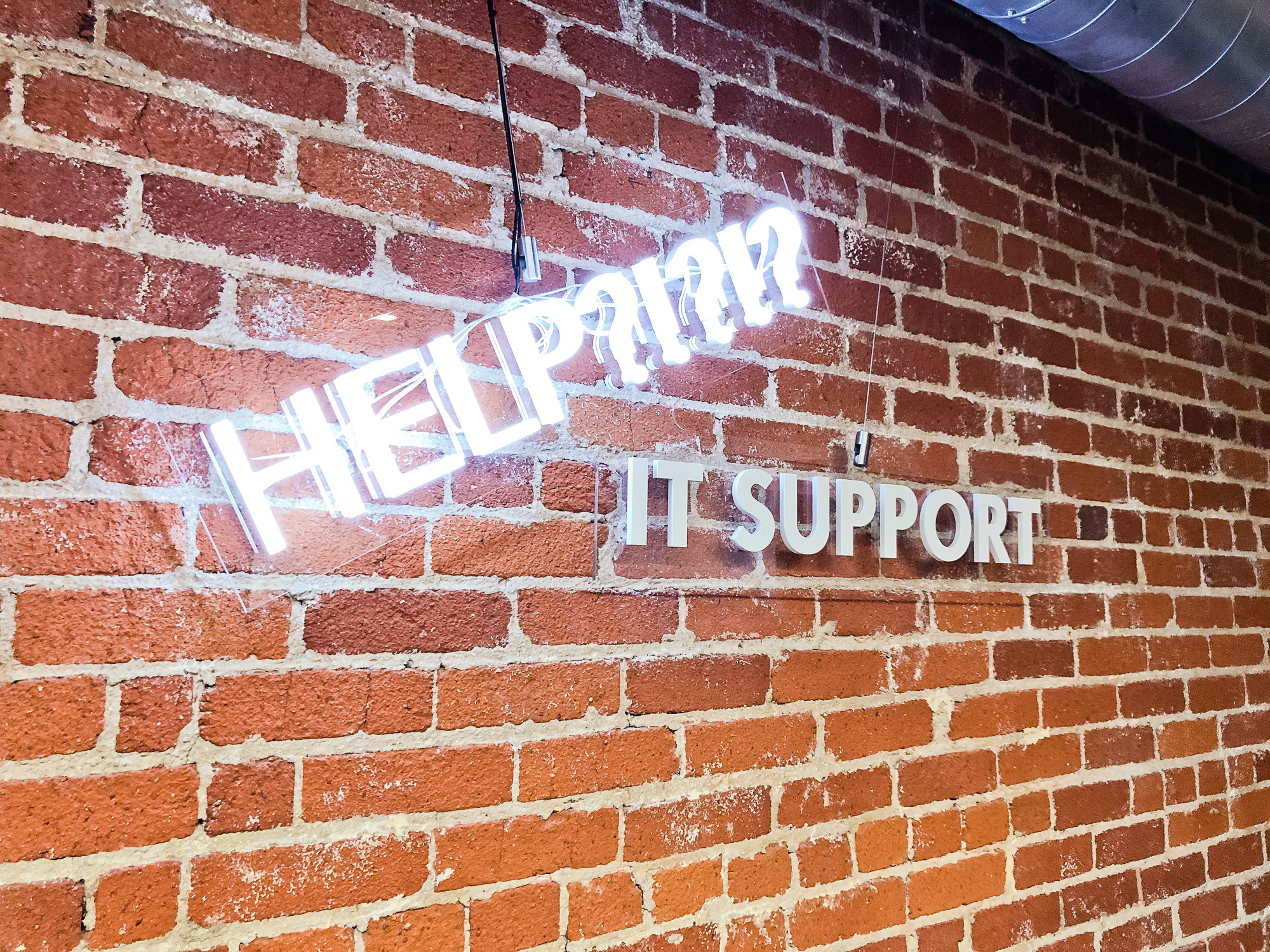Neon style IT support bar sign for the San Francisco office of Juul, an electronic cigarette company. Neon style IT support bar sign for the San Francisco office of Juul, an electronic cigarette company.