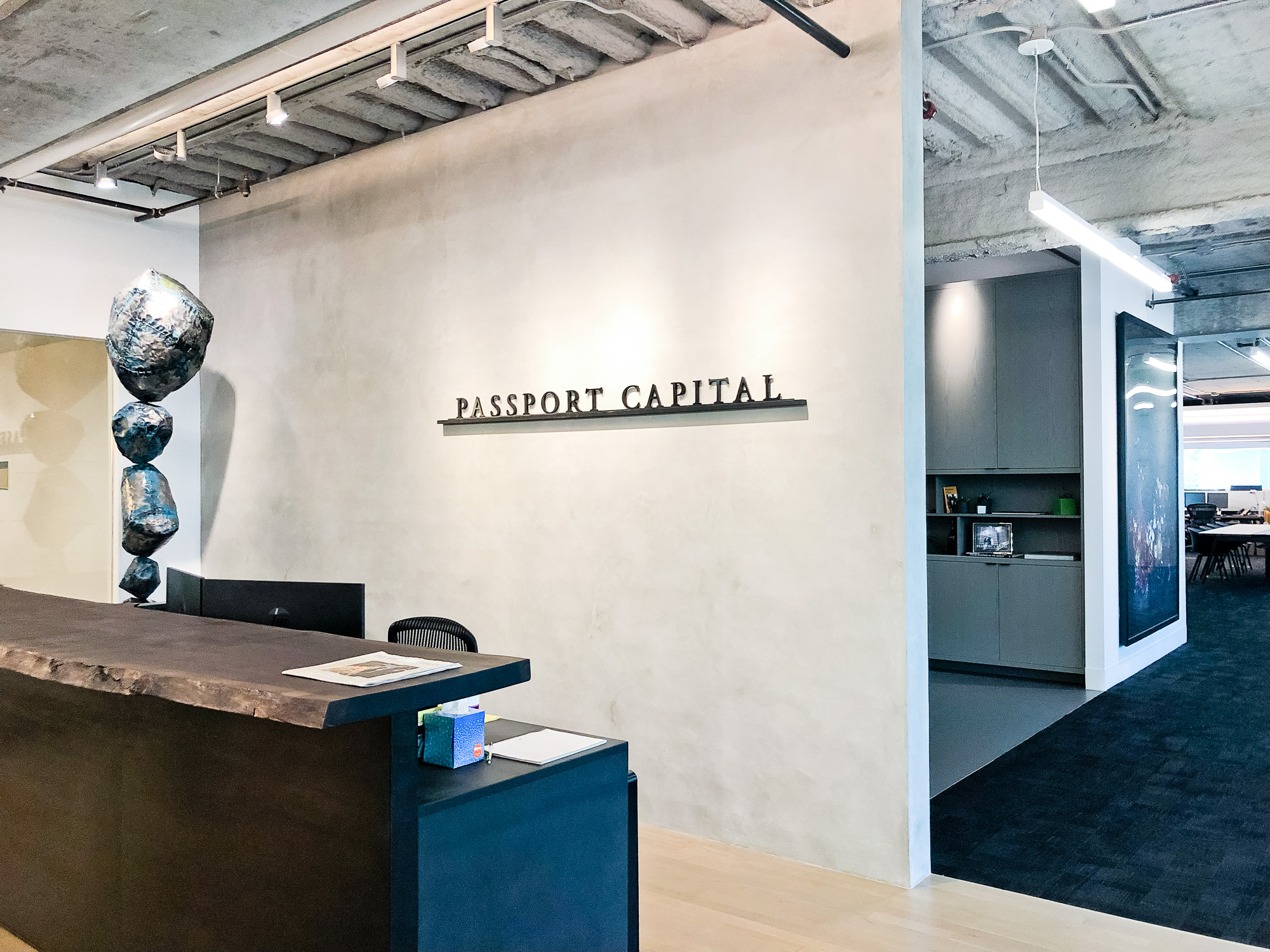 Black letters on shelf against concrete lobby wall at Passport Capital, a San Francisco-based, global thematic investment firm. Black letters on shelf against concrete lobby wall at Passport Capital, a San Francisco-based, global thematic investment firm.