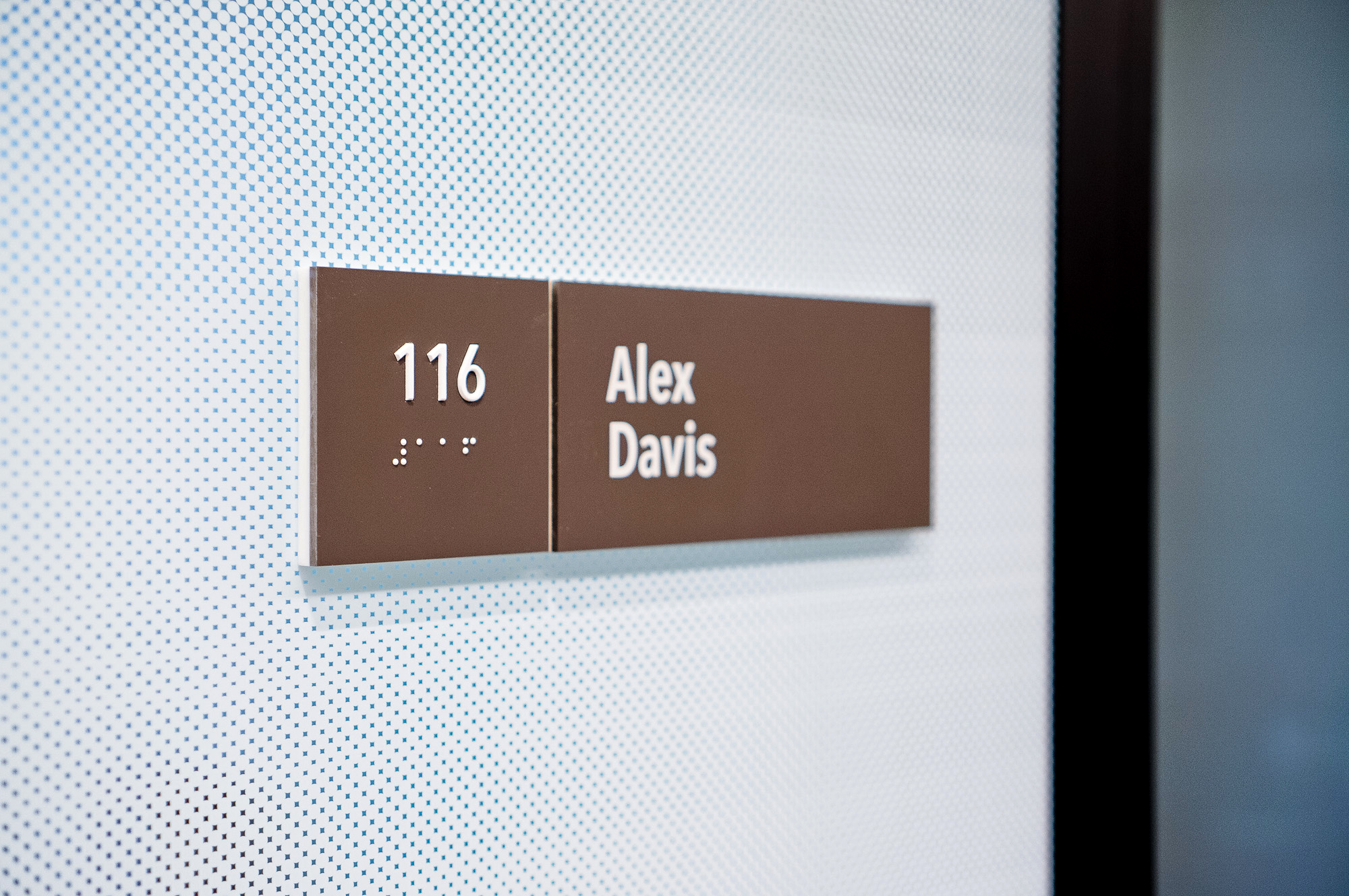 Changeable, minimal grey office ADA nameplate signs for Baker McKenzie, a multinational law firm. Changeable, minimal grey office ADA nameplate signs for Baker McKenzie, a multinational law firm.