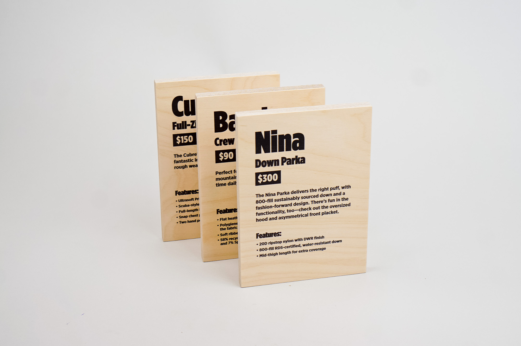 Light wood, pop-up shop product signs for Cotopaxi, a company that creates innovative outdoor products and experiences. Light wood, pop-up shop product signs for Cotopaxi, a company that creates innovative outdoor products and experiences.