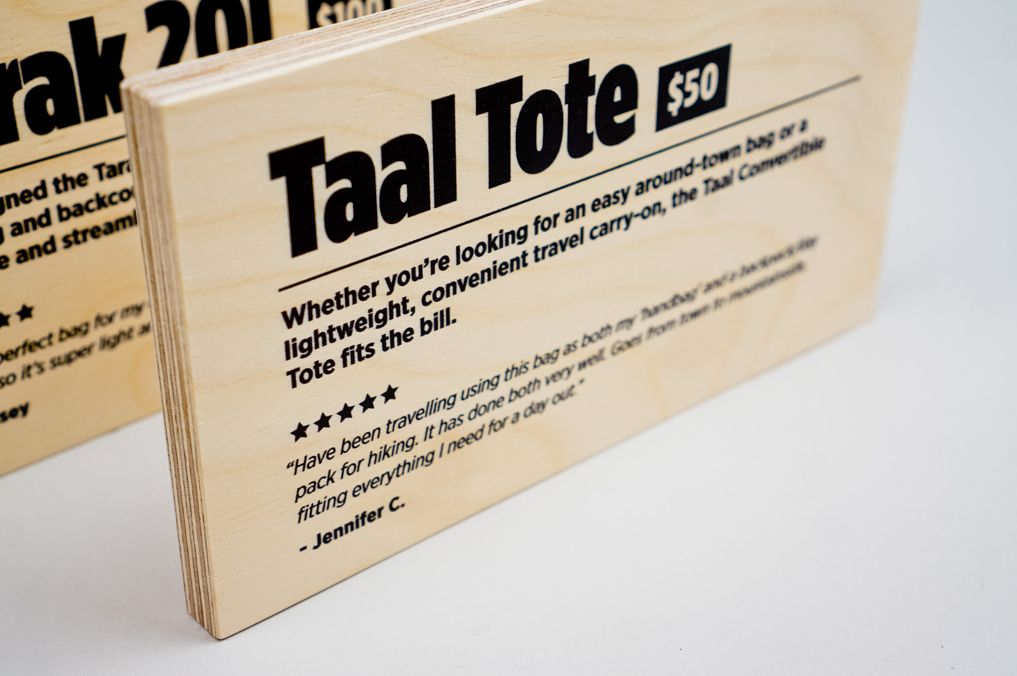 Light wood, pop-up shop product signs for Cotopaxi, a company that creates innovative outdoor products and experiences. Light wood, pop-up shop product signs for Cotopaxi, a company that creates innovative outdoor products and experiences.