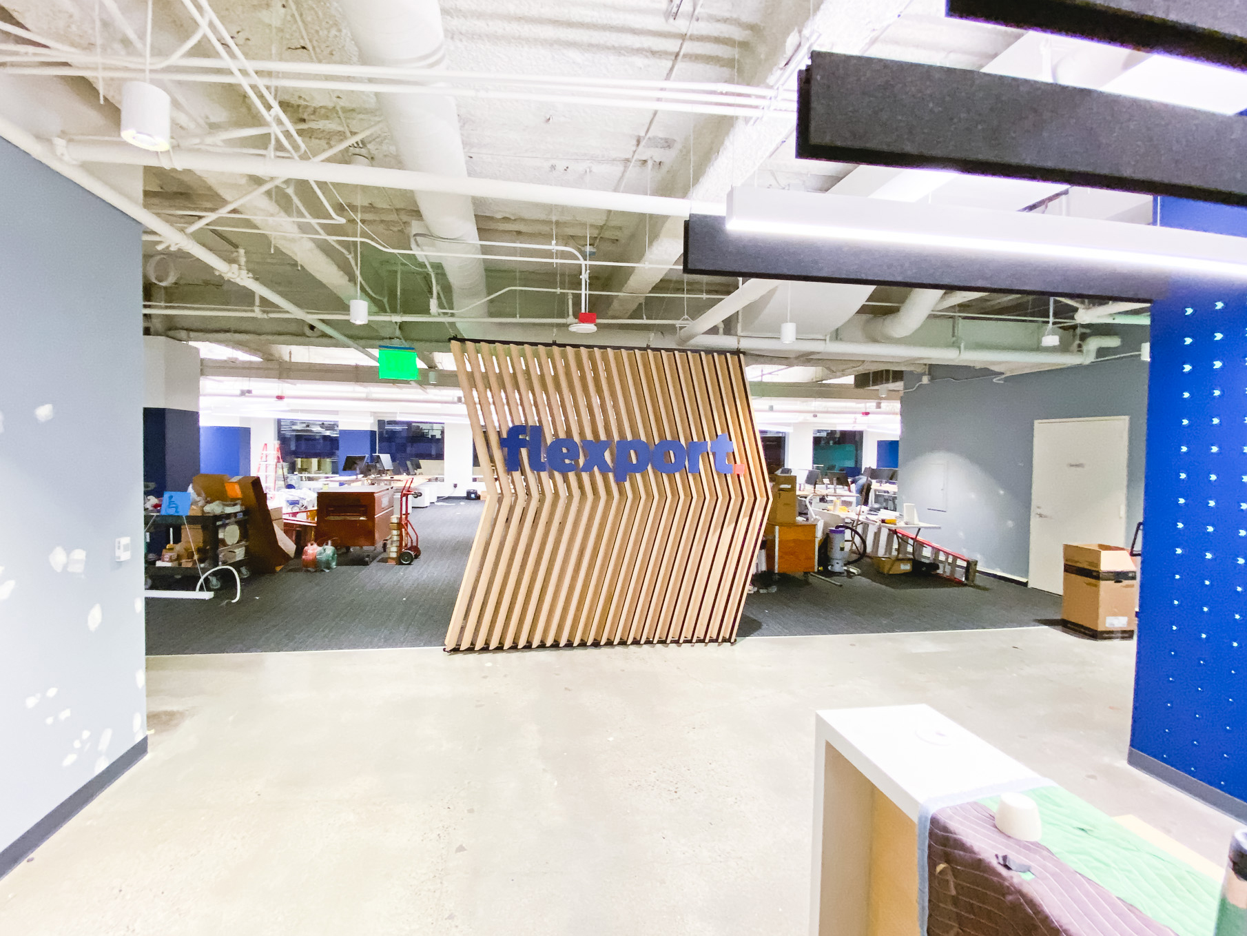 Slat wood divider wall installation for Flexport, a freight forwarding and customs brokerage company based in San Francisco, California. Slat wood divider wall installation for Flexport, a freight forwarding and customs brokerage company based in San Francisco, California.