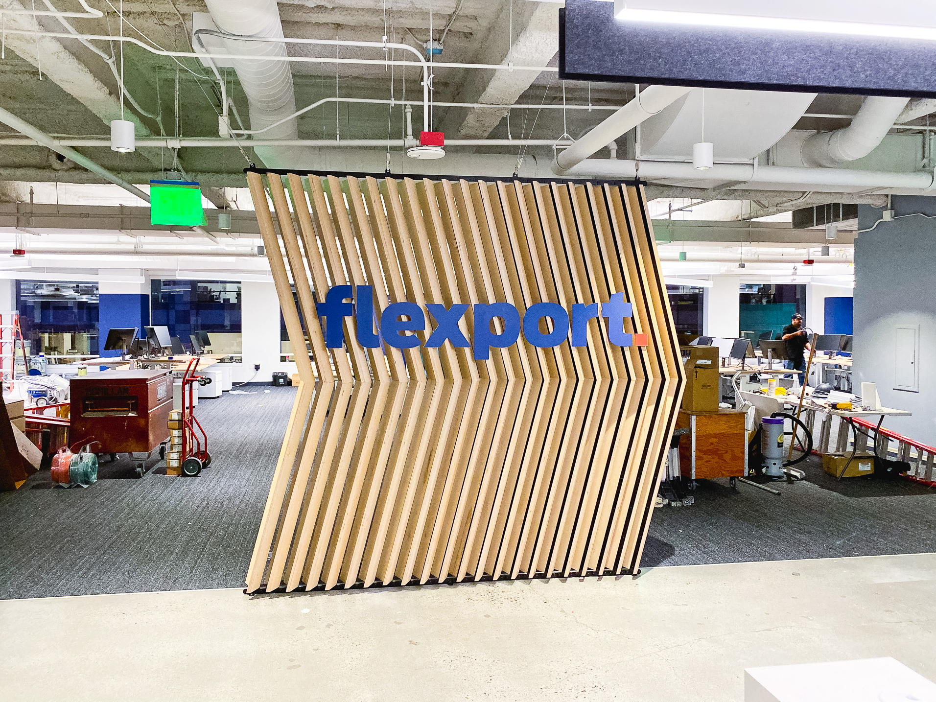 Slat wood divider wall installation for Flexport, a freight forwarding and customs brokerage company based in San Francisco, California. Slat wood divider wall installation for Flexport, a freight forwarding and customs brokerage company based in San Francisco, California.