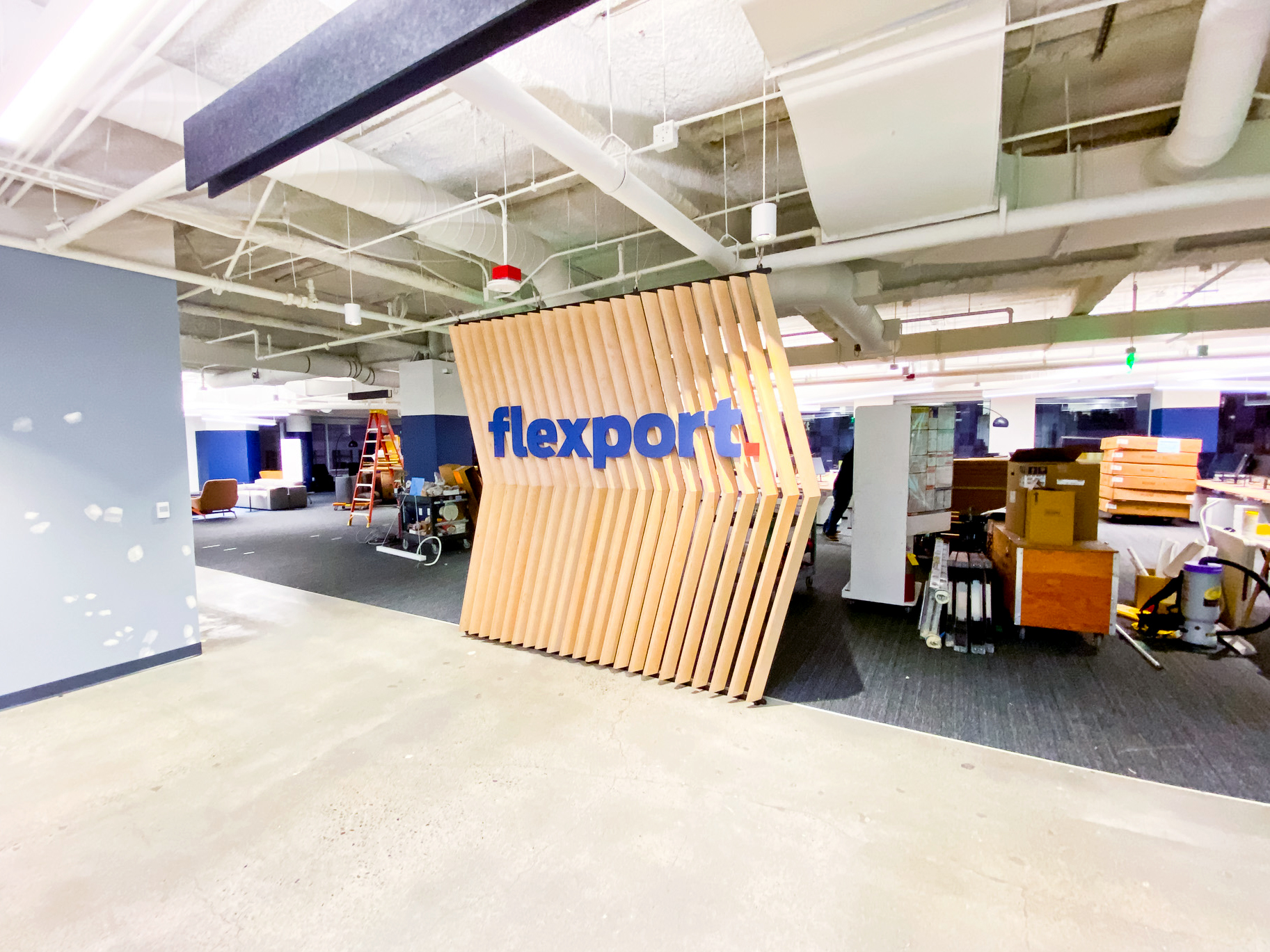 Slat wood divider wall installation for Flexport, a freight forwarding and customs brokerage company based in San Francisco, California. Slat wood divider wall installation for Flexport, a freight forwarding and customs brokerage company based in San Francisco, California.