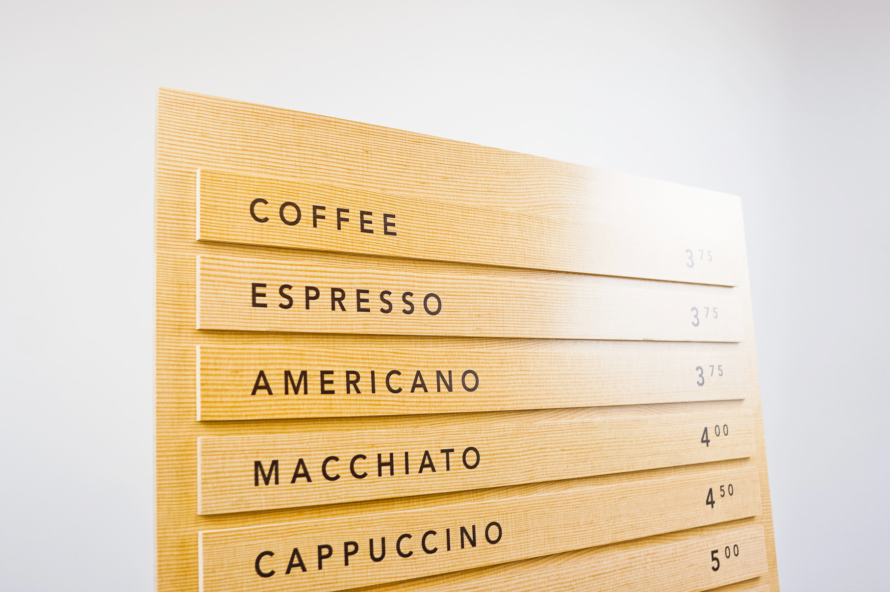 Wood menu with changeable items for Four Barrel, an independent coffee company based in San Francisco.