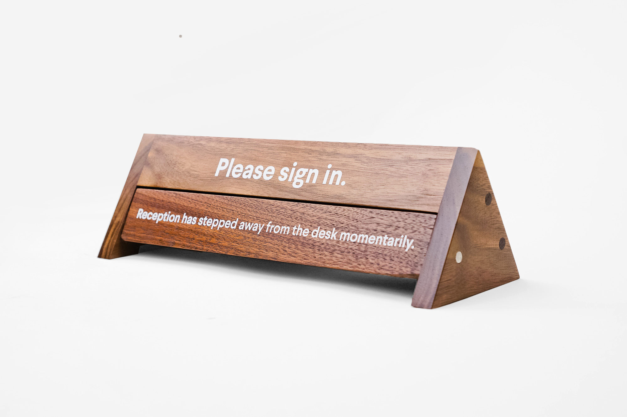 Rotating wood reception sign with various away messages for Slack, an American cloud-based set of team collaboration tools and services. Rotating wood reception sign with various away messages for Slack, an American cloud-based set of team collaboration tools and services.
