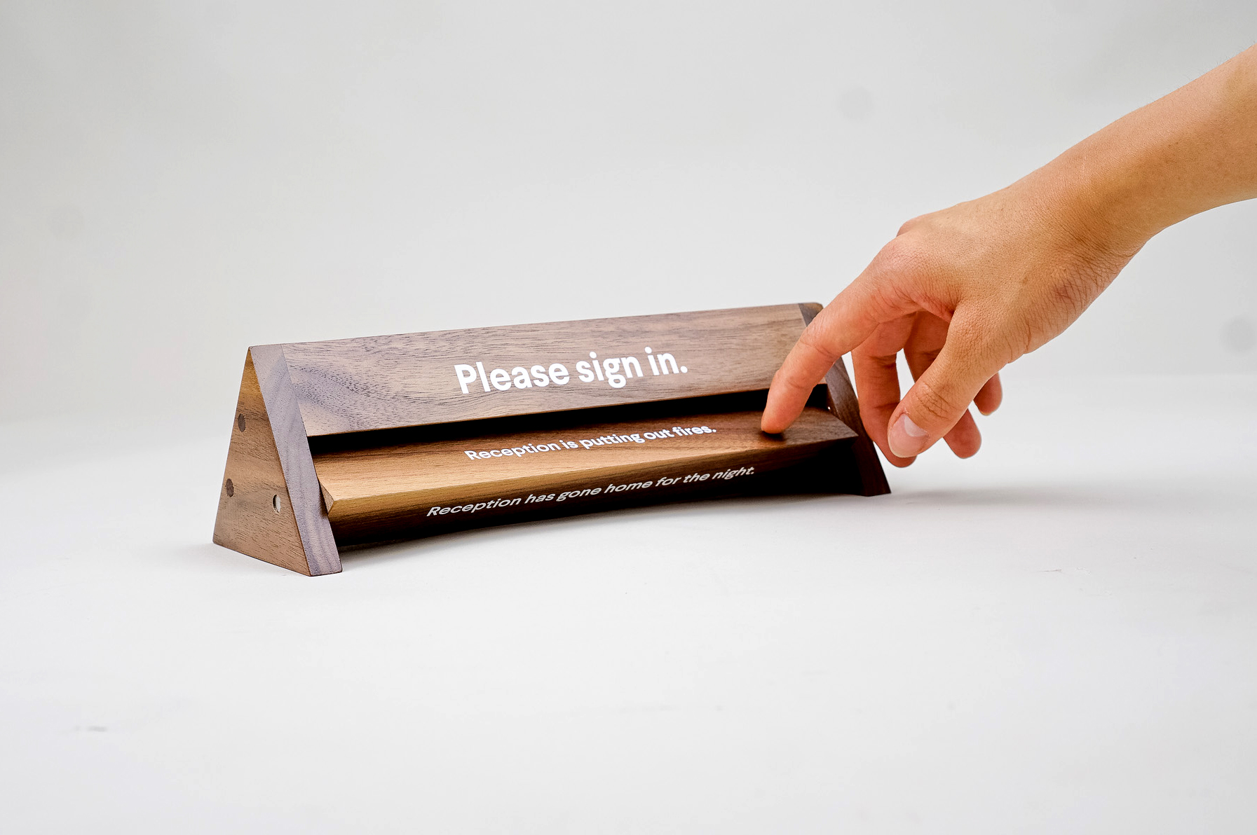 Rotating wood reception sign with various away messages for Slack, an American cloud-based set of team collaboration tools and services. Rotating wood reception sign with various away messages for Slack, an American cloud-based set of team collaboration tools and services.