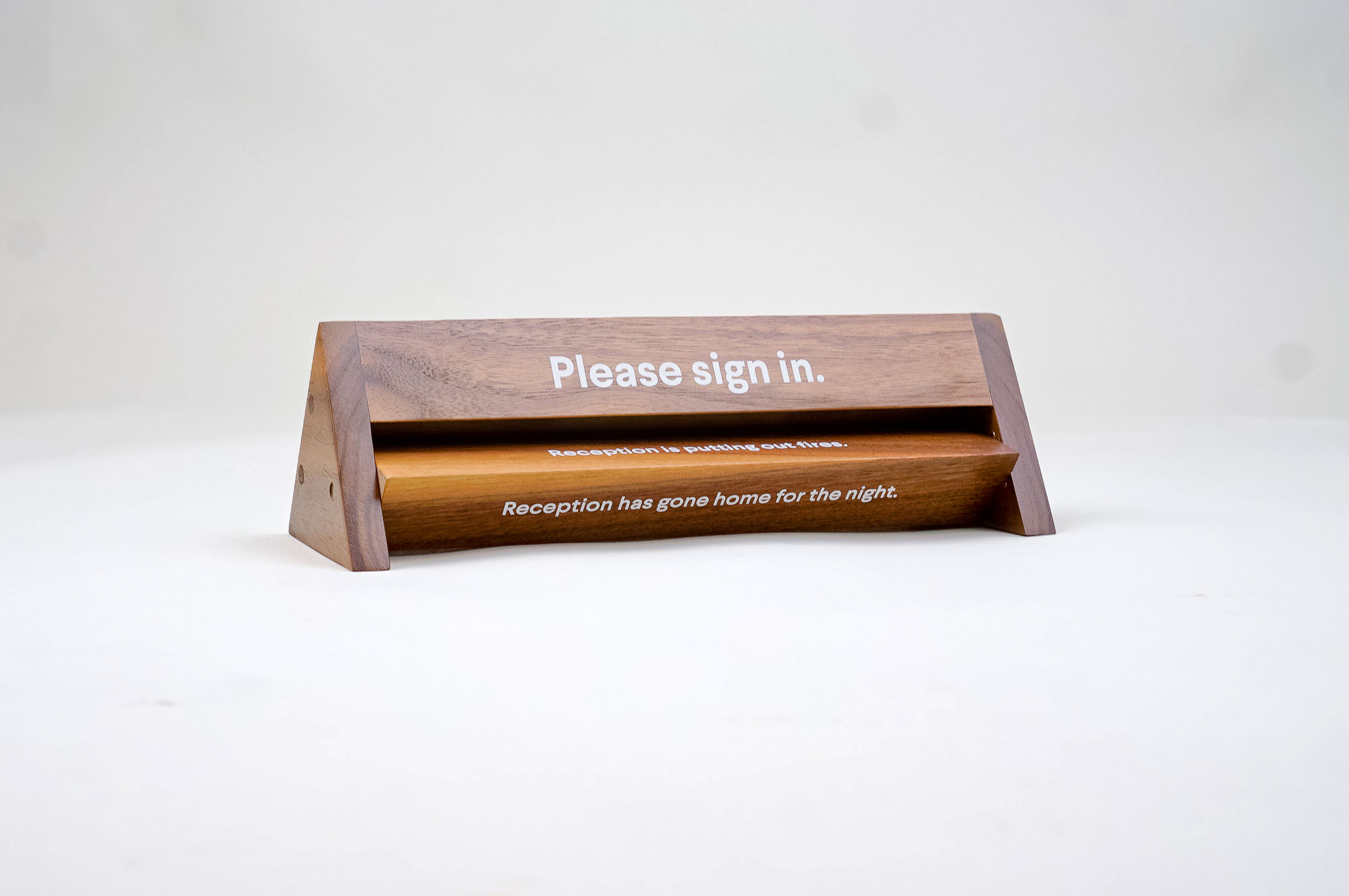 Rotating wood reception sign with various away messages for Slack, an American cloud-based set of team collaboration tools and services. Rotating wood reception sign with various away messages for Slack, an American cloud-based set of team collaboration tools and services.