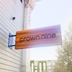 Minimal cedar blade sign for Crown Nine, a jewelry boutique of award winning jewelry artist Kate Ellen in the heart of historic Old Oakland.