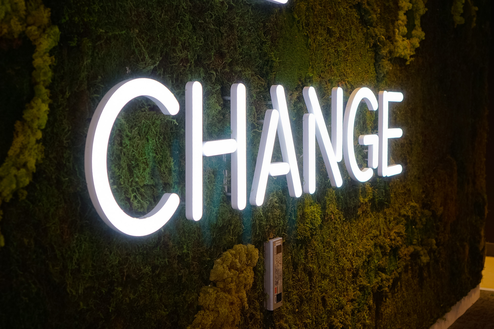 Neon-style, motivational “be the change” sign on a large moss / living wall for Scale, a San Francisco based company delivering high quality training data for AI applications such as self-driving cars, mapping, AR/VR, robotics, and more. Neon-style, motivational