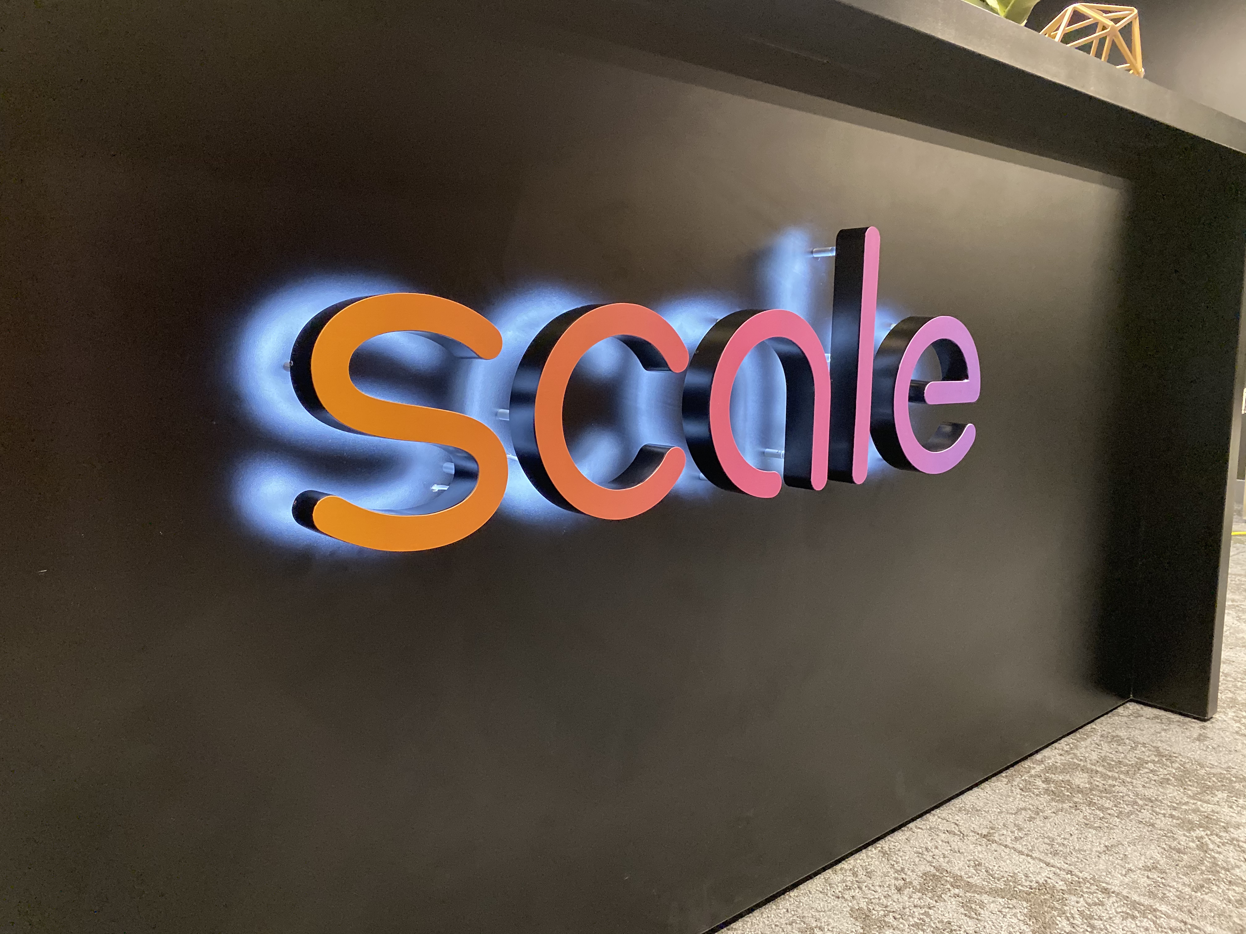 Gradient, halo-lit / back-lit illuminated sign on reception desk in the lobby of Scale, a San Francisco based company delivering high quality training data for AI applications such as self-driving cars, mapping, AR/VR, robotics, and more. Gradient, halo-lit / back-lit illuminated sign on reception desk in the lobby of Scale, a San Francisco based company delivering high quality training data for AI applications such as self-driving cars, mapping, AR/VR, robotics, and more.