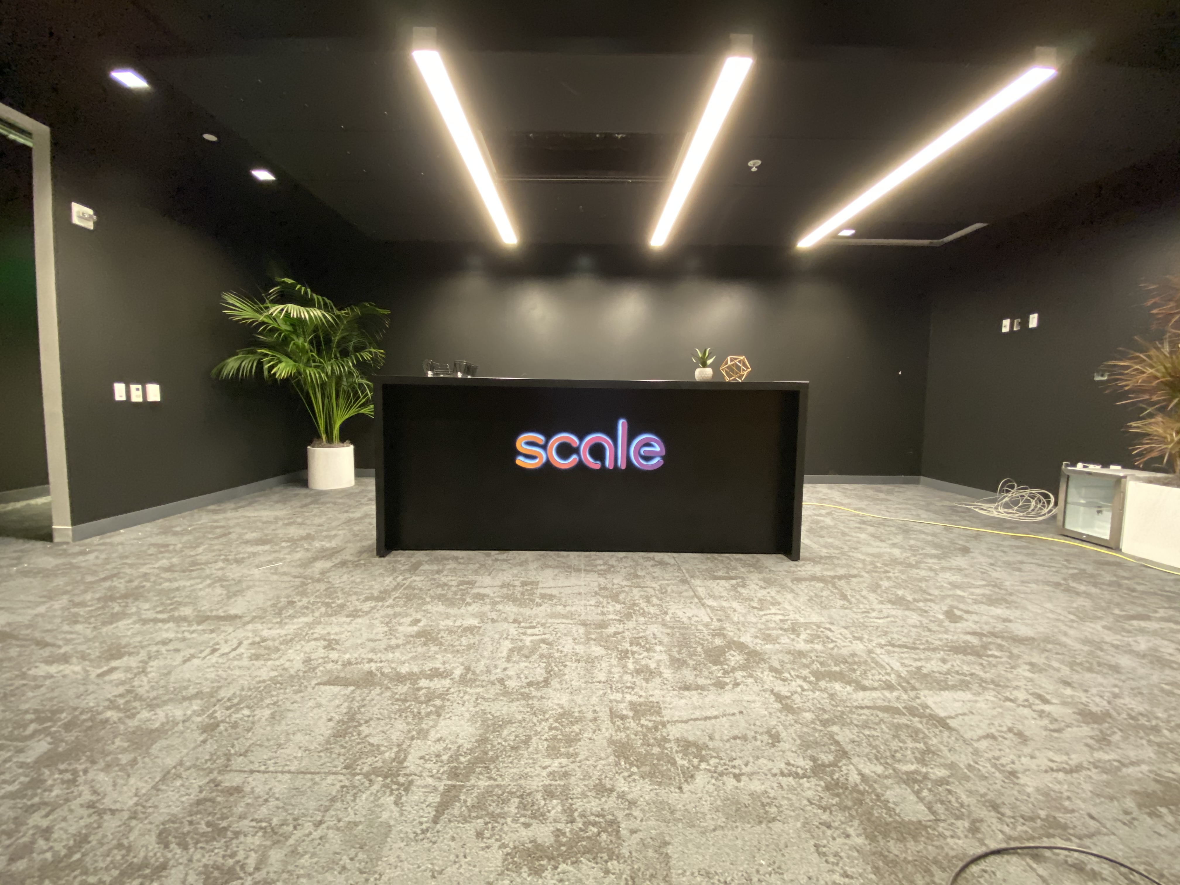 Gradient, halo-lit / back-lit illuminated sign on reception desk in the lobby of Scale, a San Francisco based company delivering high quality training data for AI applications such as self-driving cars, mapping, AR/VR, robotics, and more. Gradient, halo-lit / back-lit illuminated sign on reception desk in the lobby of Scale, a San Francisco based company delivering high quality training data for AI applications such as self-driving cars, mapping, AR/VR, robotics, and more.