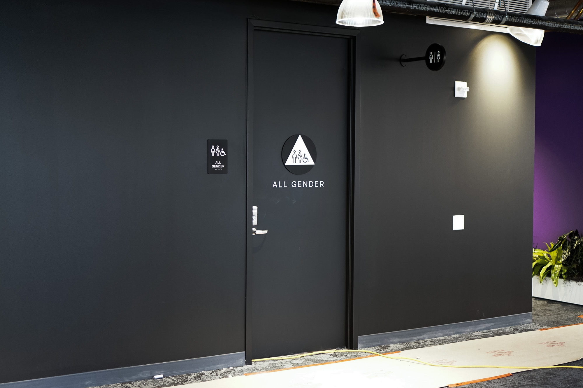 Modern, matte black restroom signs with white icons on black walls for the restrooms of Scale, a San Francisco based company delivering high quality training data for AI applications such as self-driving cars, mapping, AR/VR, robotics, and more. Modern, matte black restroom signs with white icons on black walls for the restrooms of Scale, a San Francisco based company delivering high quality training data for AI applications such as self-driving cars, mapping, AR/VR, robotics, and more.