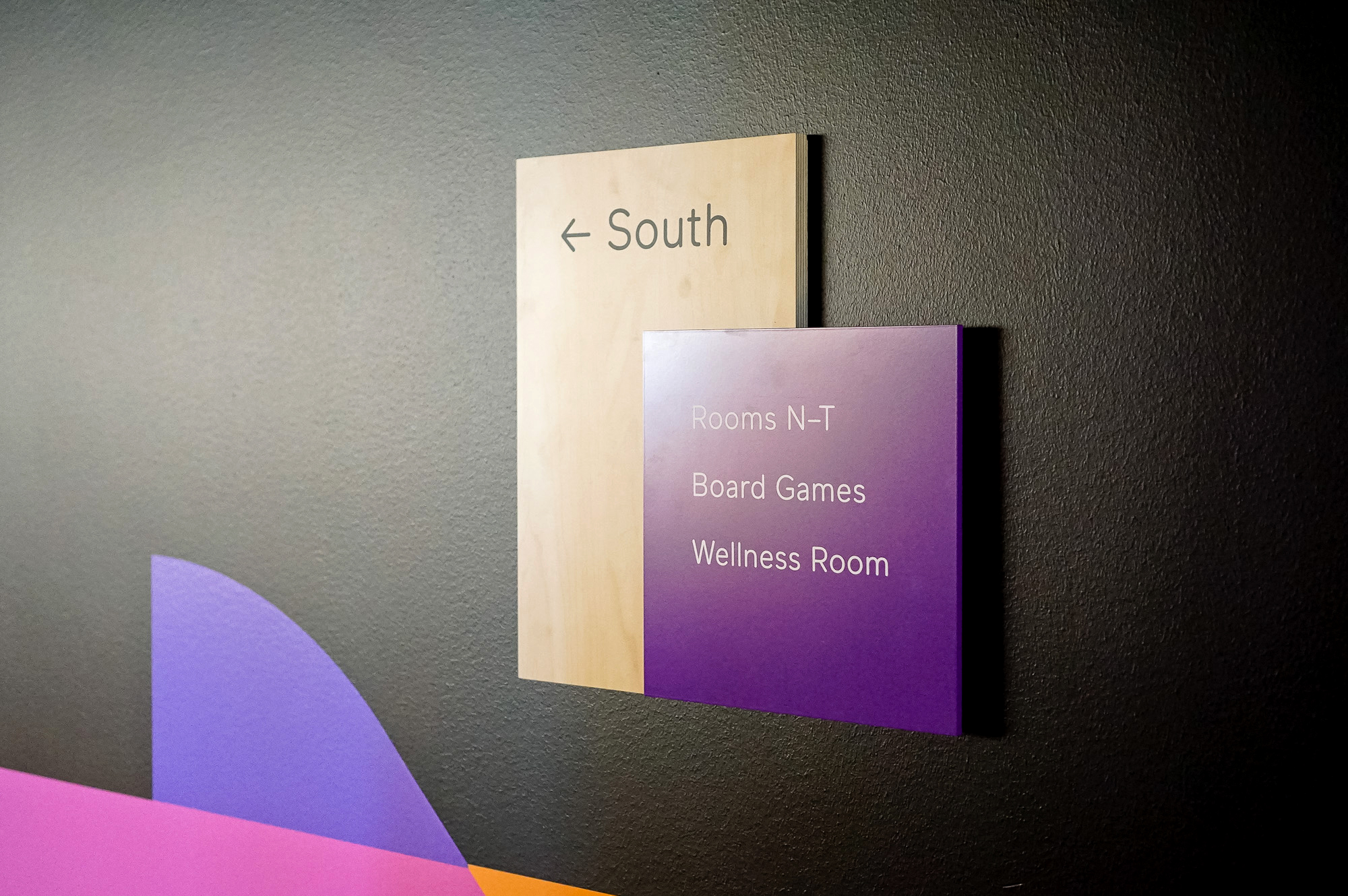 Modern light wood and colored wayfinding wall panels for Scale, a San Francisco based company delivering high quality training data for AI applications such as self-driving cars, mapping, AR/VR, robotics, and more.