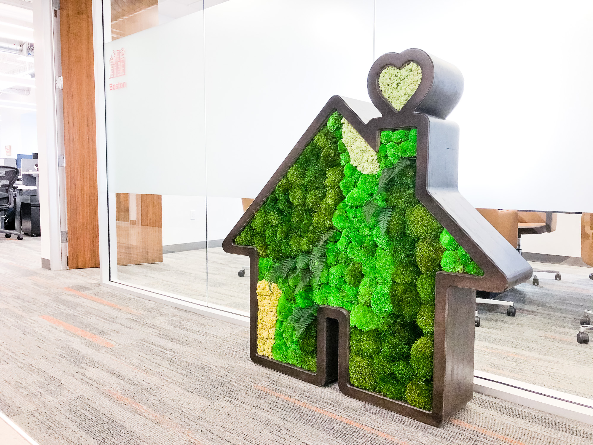 Dark wood house silhouette logo filled with preserved moss art for Zumper, a full-service rental platform. Dark wood house silhouette logo filled with preserved moss art for Zumper, a full-service rental platform.