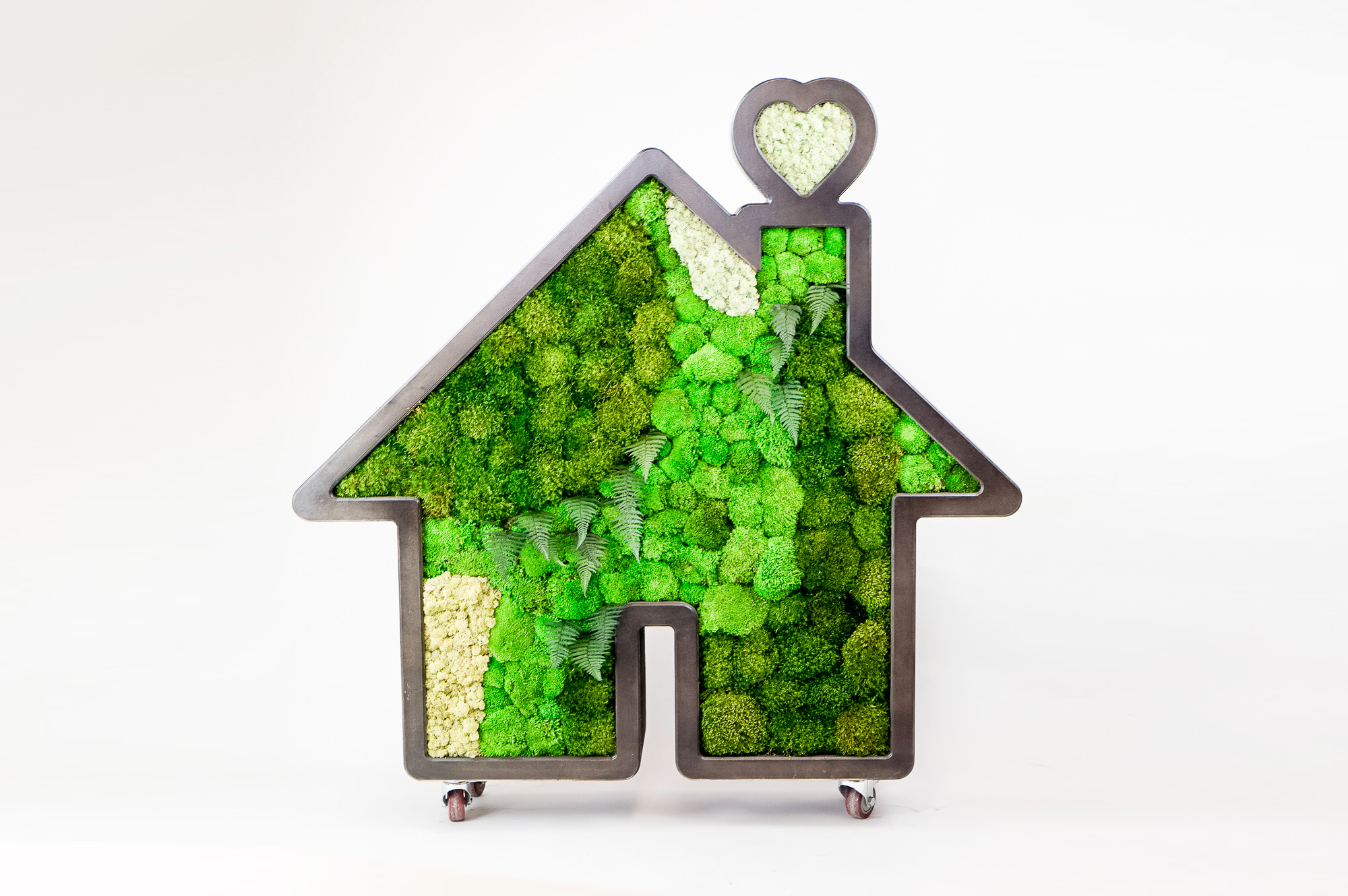 Dark wood house silhouette logo filled with preserved moss art for Zumper, a full-service rental platform. Dark wood house silhouette logo filled with preserved moss art for Zumper, a full-service rental platform.
