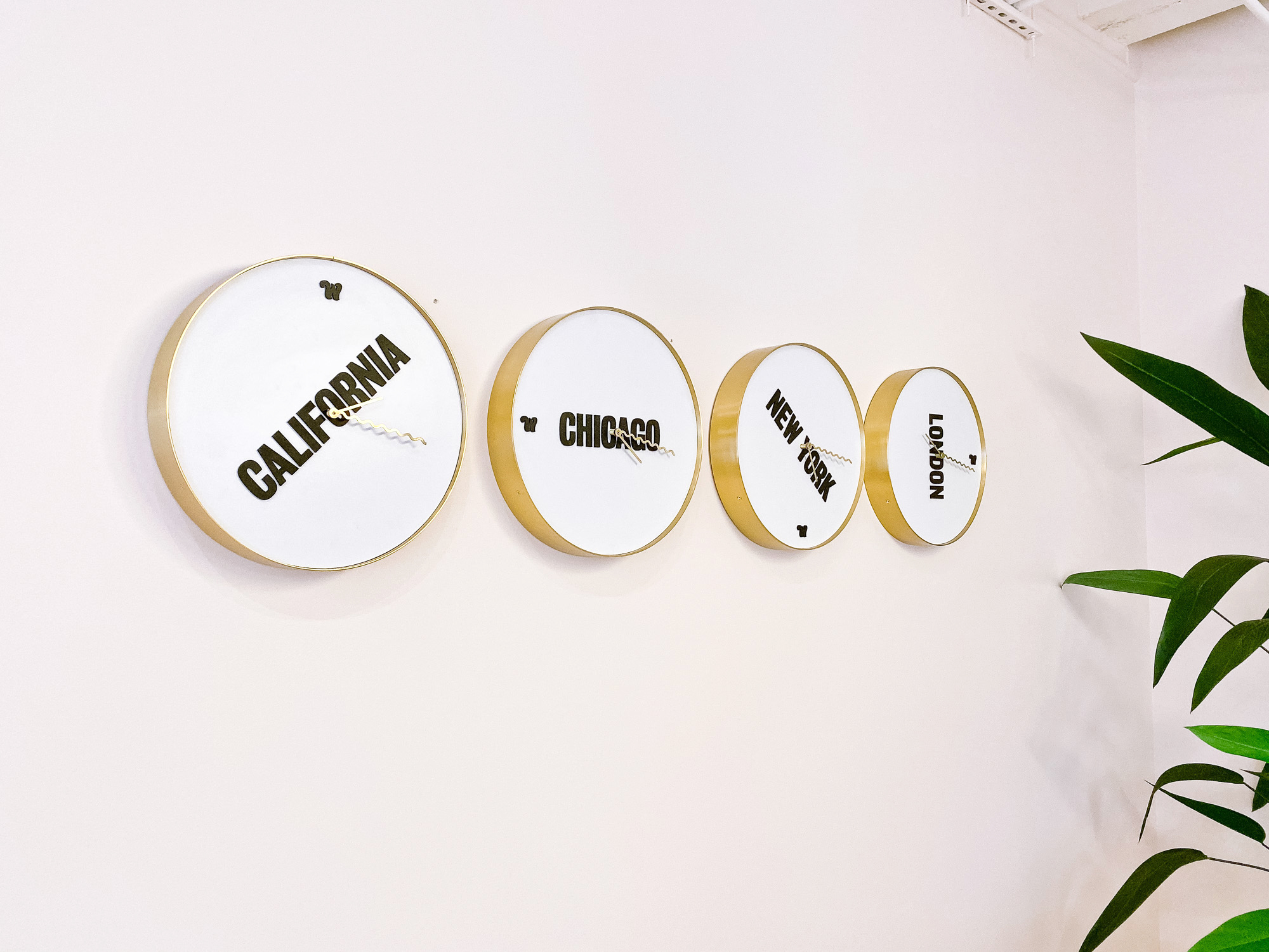 Custom brass and white international time zone clock wall for the San Francisco expansion of The Wing, a network of work and community spaces designed for women. Custom brass and white international time zone clock wall for the San Francisco expansion of The Wing, a network of work and community spaces designed for women.
