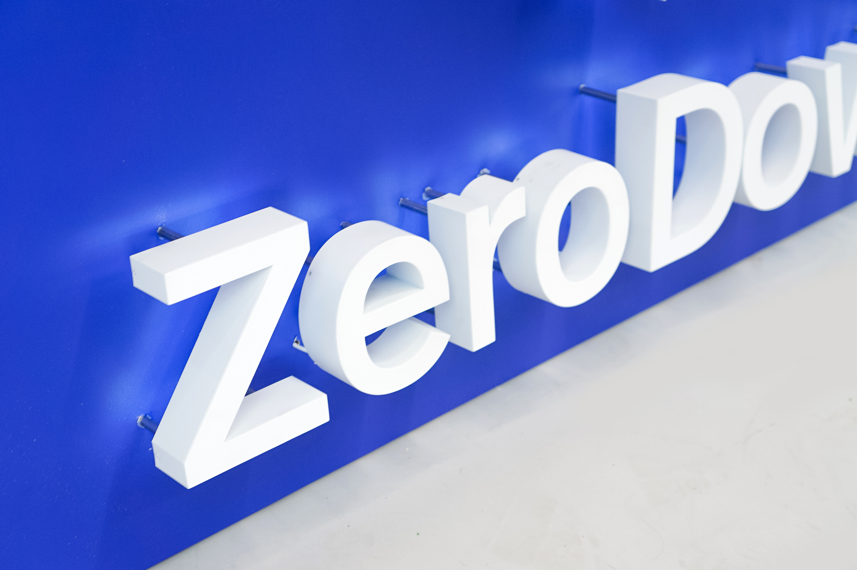 Back-lit, illuminated blue and white lobby sign for Zerodown, a company that couples technology and a debt-fueled real estate fund to allow home-buyers to forgo the traditional down payment process required to purchase a home. Back-lit, illuminated blue and white lobby sign for Zerodown, a company that couples technology and a debt-fueled real estate fund to allow home-buyers to forgo the traditional down payment process required to purchase a home.