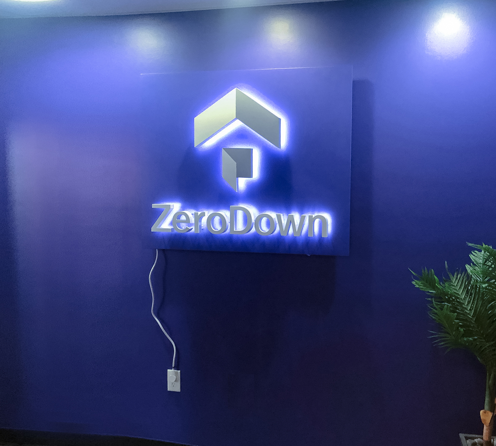 Back-lit, illuminated blue and white lobby sign for Zerodown, a company that couples technology and a debt-fueled real estate fund to allow home-buyers to forgo the traditional down payment process required to purchase a home. Back-lit, illuminated blue and white lobby sign for Zerodown, a company that couples technology and a debt-fueled real estate fund to allow home-buyers to forgo the traditional down payment process required to purchase a home.