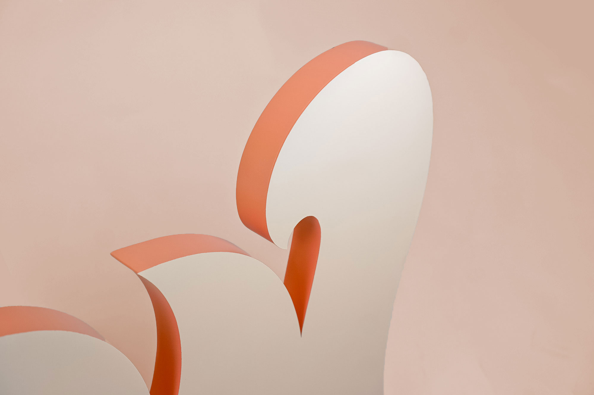 “W” wing logo in tone-on-tone paint with contrasting edges for the lobby of the Williamsburg location of The Wing, a co-working space for women.