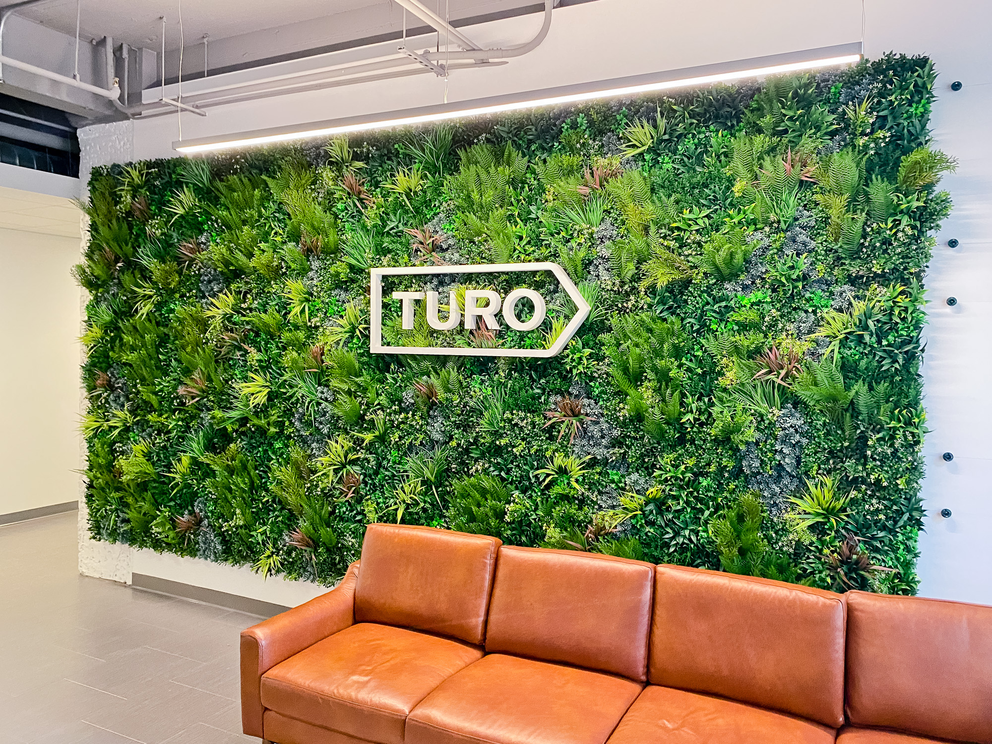 White dimensional logo on Vistagreen living wall for the lobby of Turo, an American peer-to-peer carsharing company. White dimensional logo on Vistagreen living wall for the lobby of Turo, an American peer-to-peer carsharing company.
