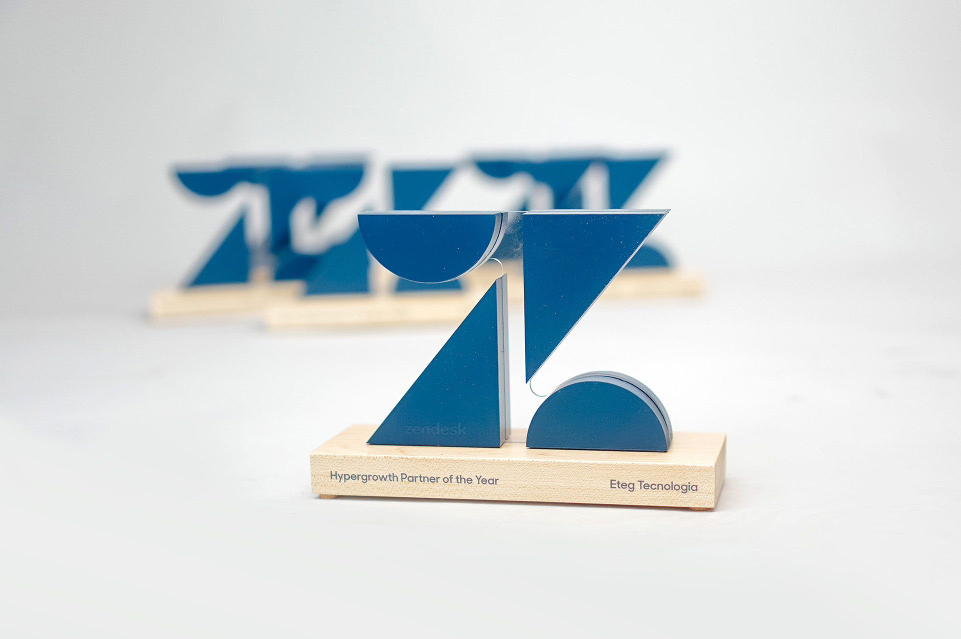 Custom cut, logo shaped partner award with optical illusion for Zendesk, a customer service software company headquartered in San Francisco, California. Custom cut, logo shaped partner award with optical illusion for Zendesk, a customer service software company headquartered in San Francisco, California.