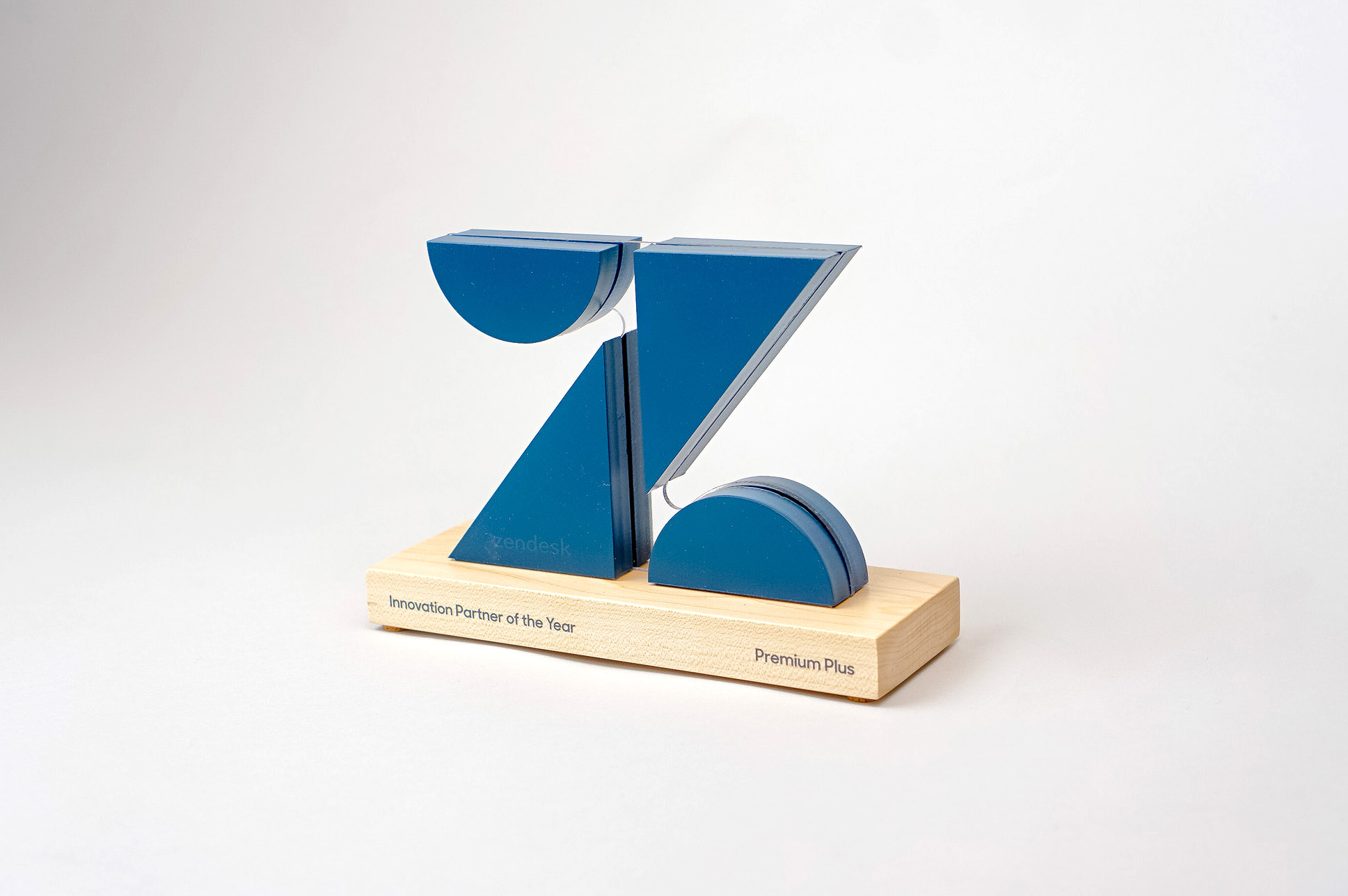 Custom cut, logo shaped partner award with optical illusion for Zendesk, a customer service software company headquartered in San Francisco, California.