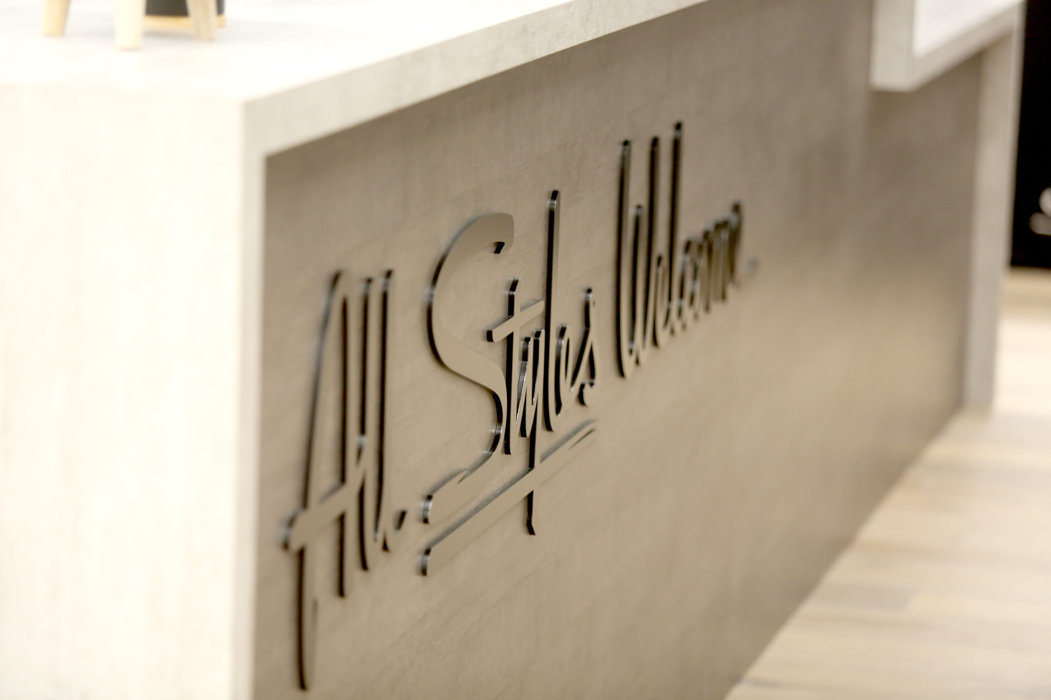 Black script front desk sign for the lobby at Styles Studios, a fitness club in Peoria, IL. Black script front desk sign for the lobby at Styles Studios, a fitness club in Peoria, IL.