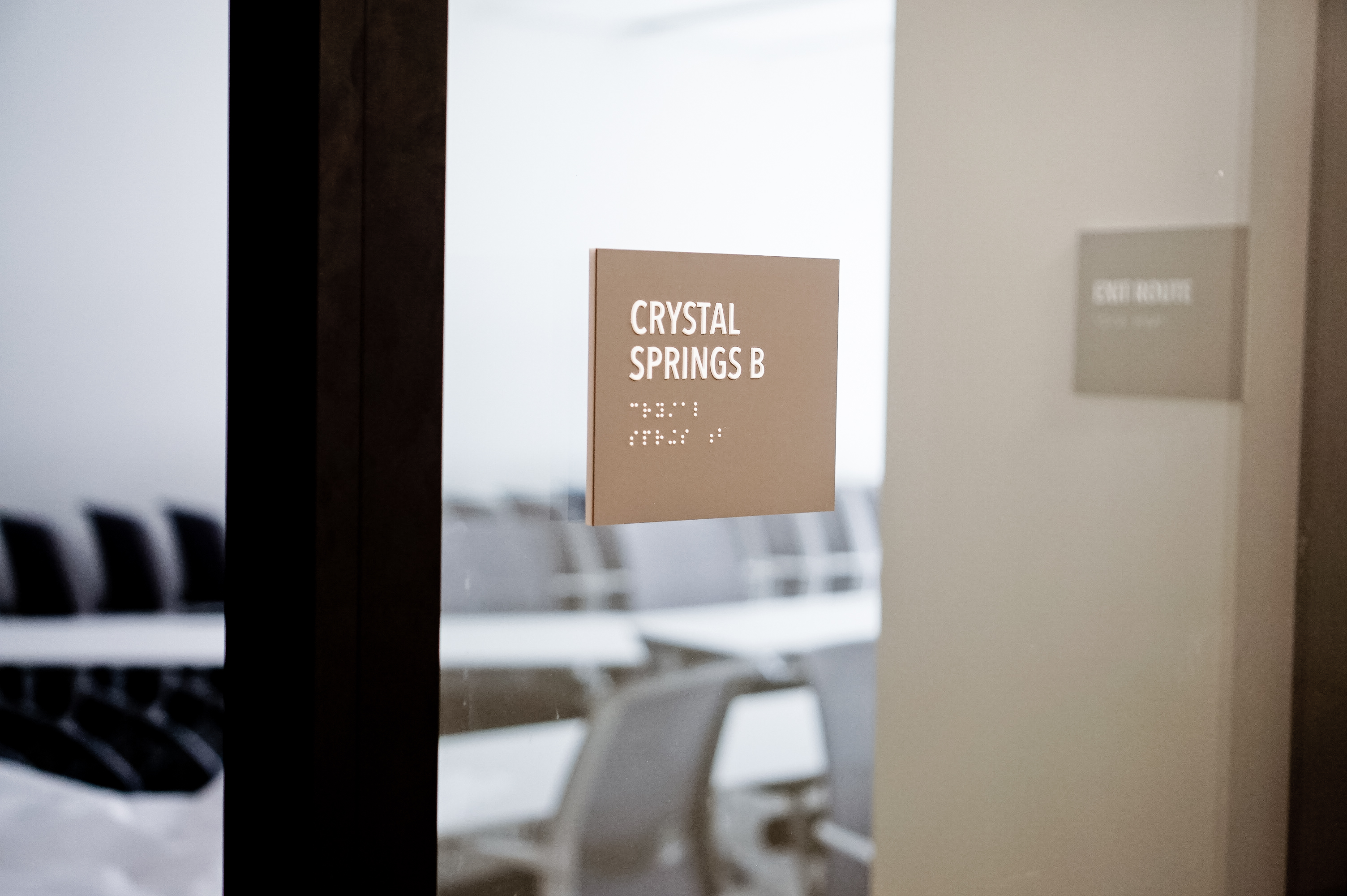 Minimal grey office ADA room signs for Baker McKenzie, a multinational law firm. Minimal grey office ADA room signs for Baker McKenzie, a multinational law firm.