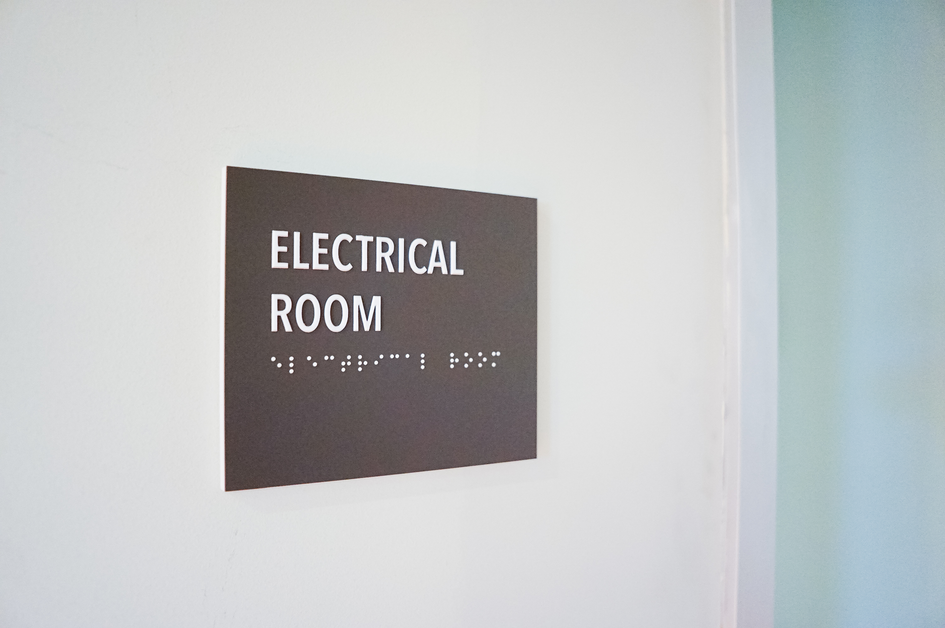 Minimal grey office ADA electrical room sign for Baker McKenzie, a multinational law firm. Minimal grey office ADA electrical room sign for Baker McKenzie, a multinational law firm.