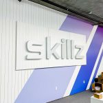 Illuminated metal sign for the reception desk at the San Francisco office of Skillz, an online mobile multiplayer competition platform.