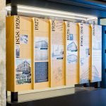 Wood/mixed media dimensional timeline display in the lobby of Uptown Station, an office and retail complex in a restored historic building located in downtown Oakland.