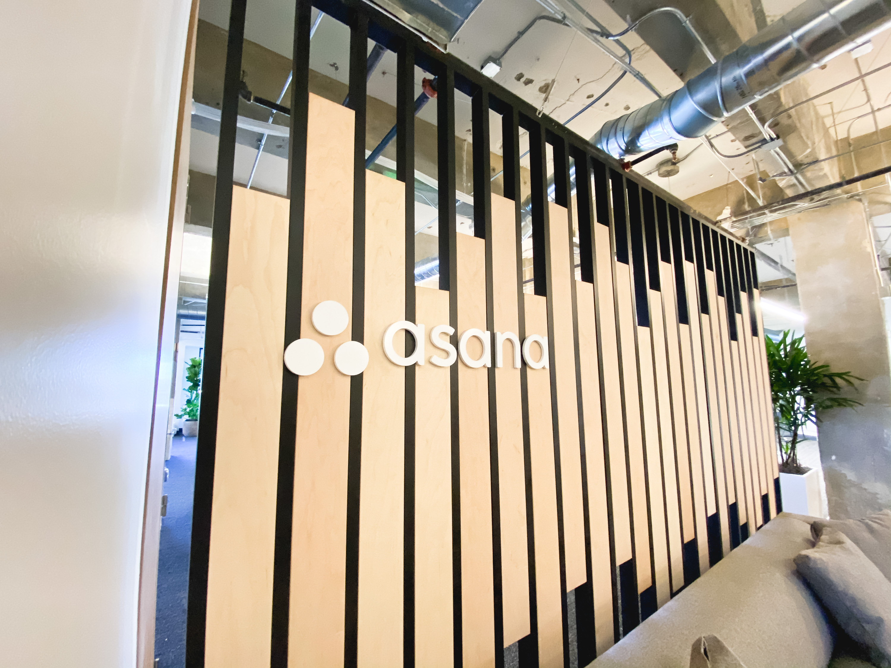 Custom slat wood and metal divider wall for the San Francisco office of Asana, a web and mobile application designed to help teams organize, track, and manage their work. Custom slat wood and metal divider wall for the San Francisco office of Asana, a web and mobile application designed to help teams organize, track, and manage their work.