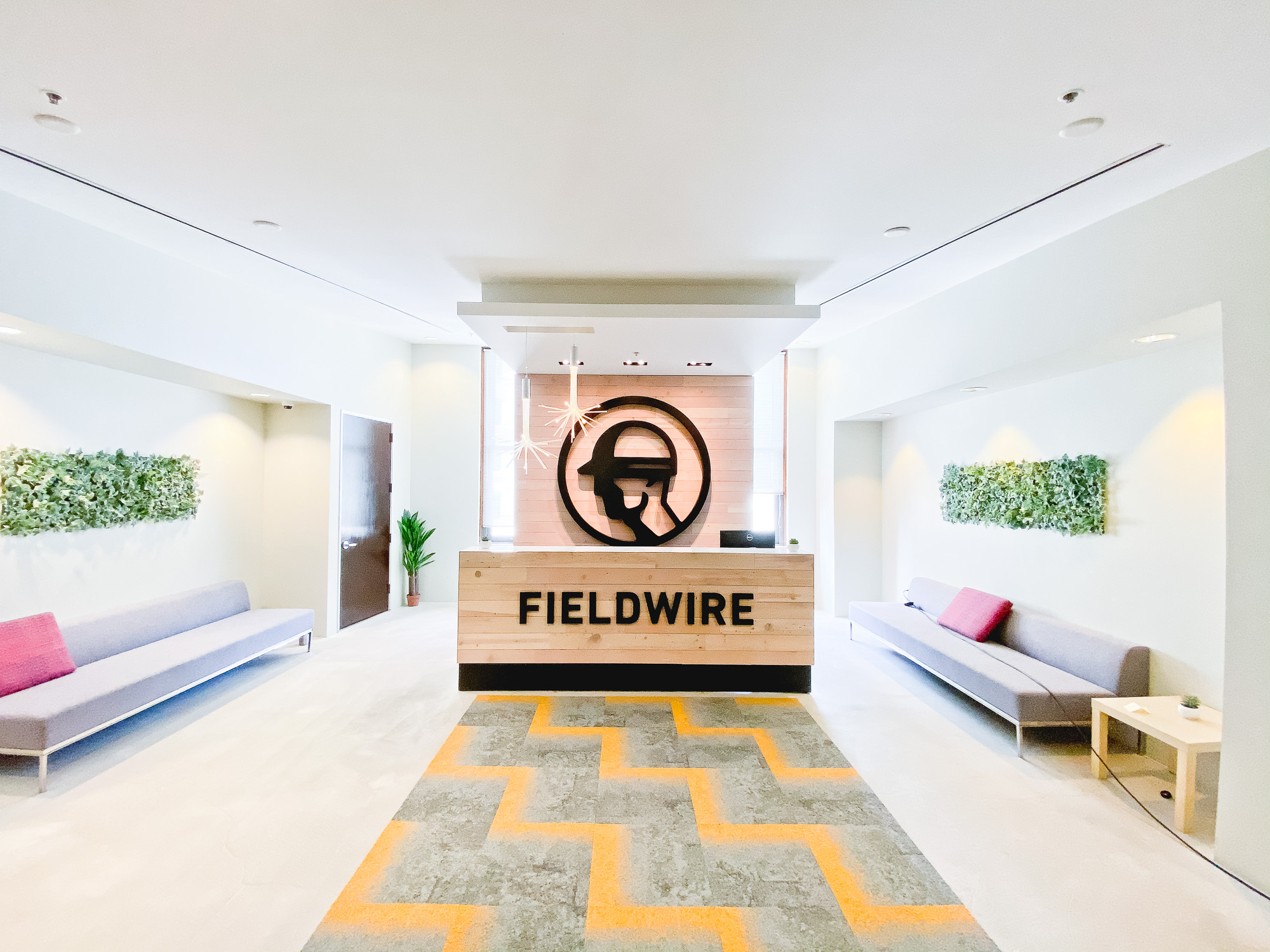 Dimensional black reception wall and desk sign for the San Francisco lobby of Fieldwire, a company creating a construction field management platform designed for the jobsite. Dimensional black reception wall and desk sign for the San Francisco lobby of Fieldwire, a company creating a construction field management platform designed for the jobsite.