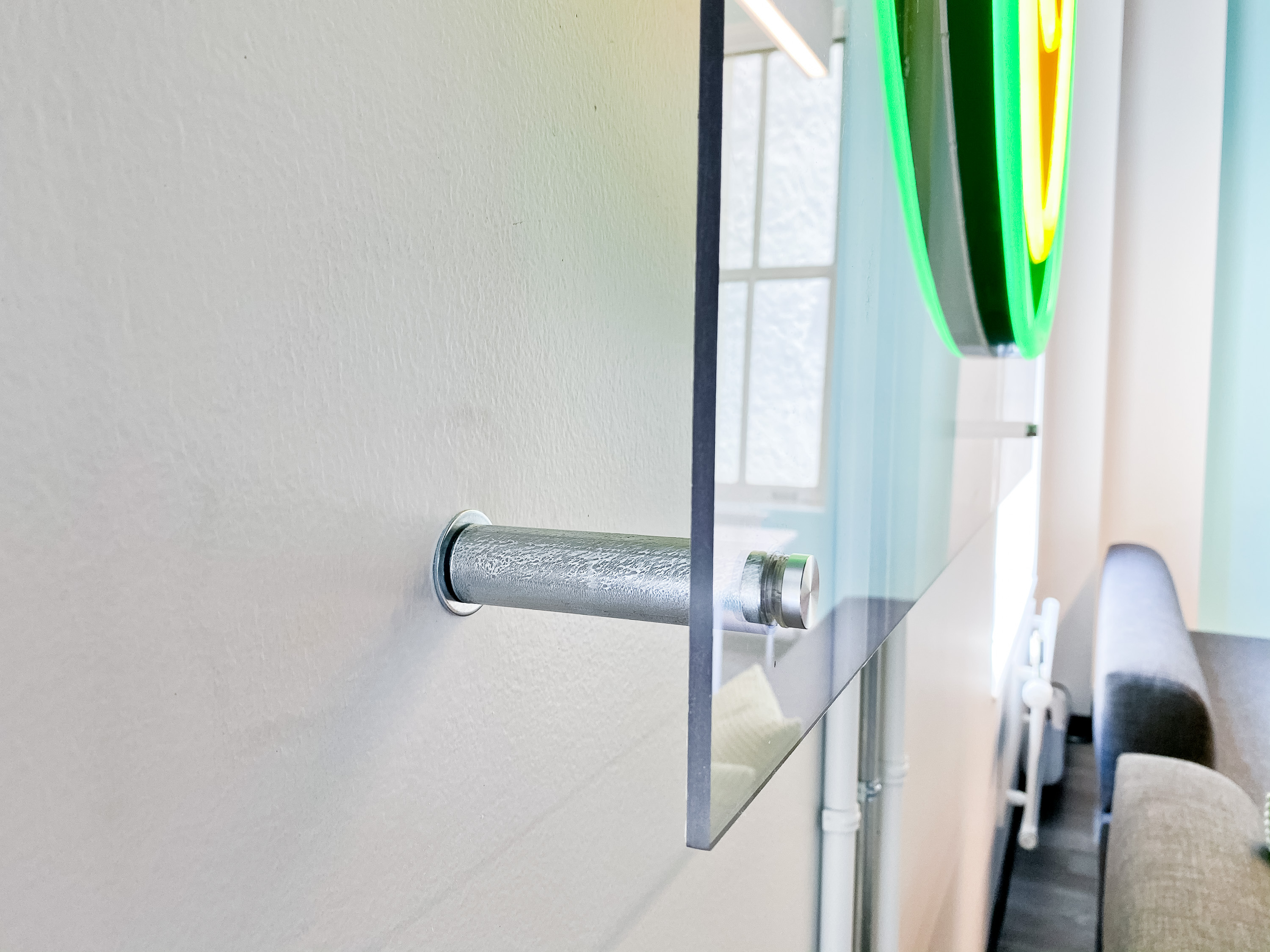 Neon avocado sign with clear acrylic backer on white wall for the San Francisco office of Meltwater, a software as a service company that develops and markets media monitoring and business intelligence software. Neon avocado sign with clear acrylic backer on white wall for the San Francisco office of Meltwater, a software as a service company that develops and markets media monitoring and business intelligence software.