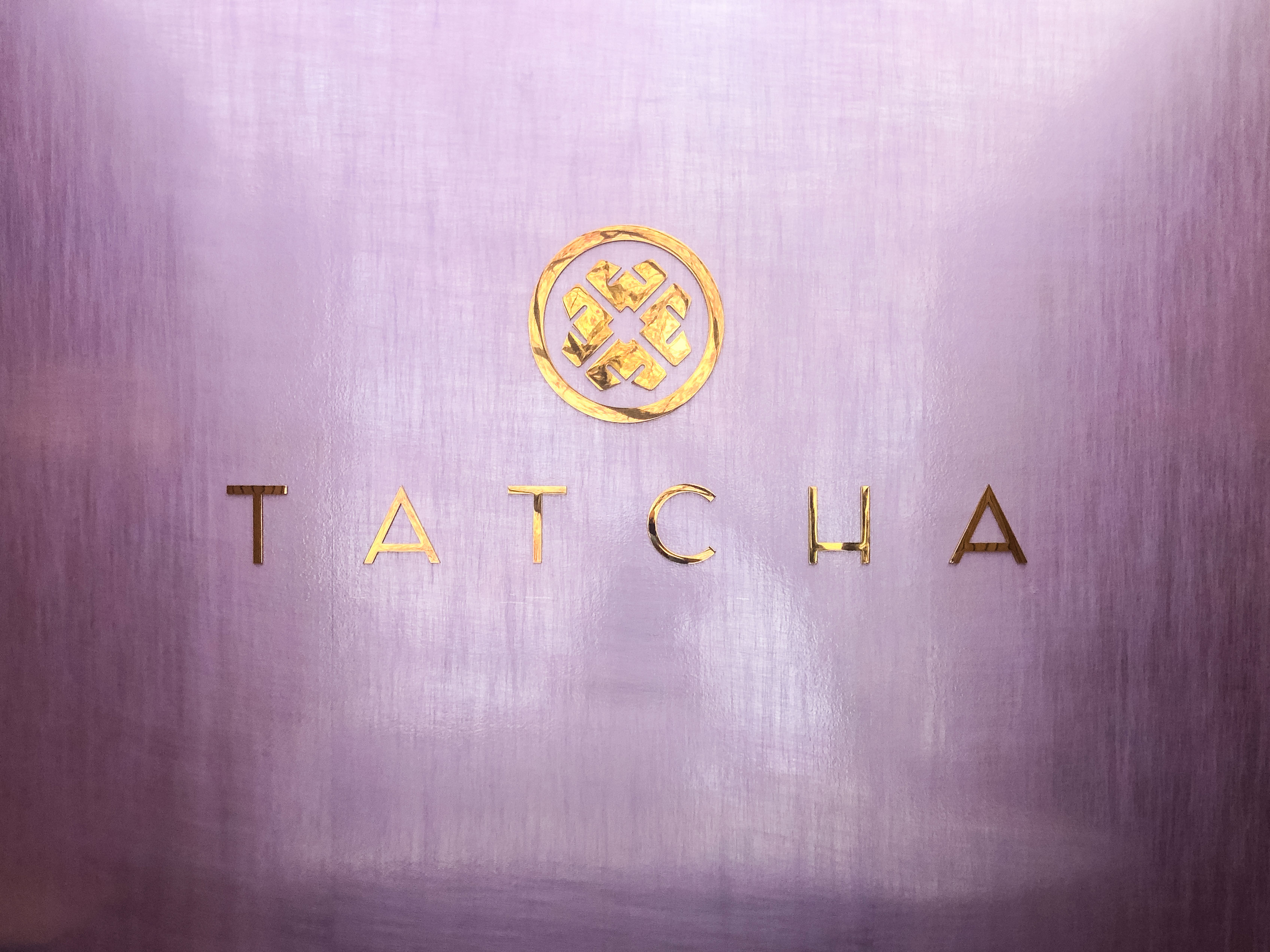 Solid polished brass sign on purple silk wall for the lobby at Tatcha, a company that creates luxury Japanese beauty products. Solid polished brass sign on purple silk wall for the lobby at Tatcha, a company that creates luxury Japanese beauty products.
