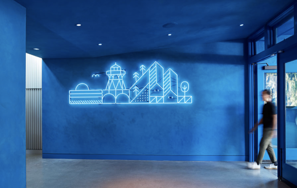 Blue neon artwork on blue wall for the entrance of Fort Point Brewery in San Francisco, CA. (Photo: Mariko Reed)
