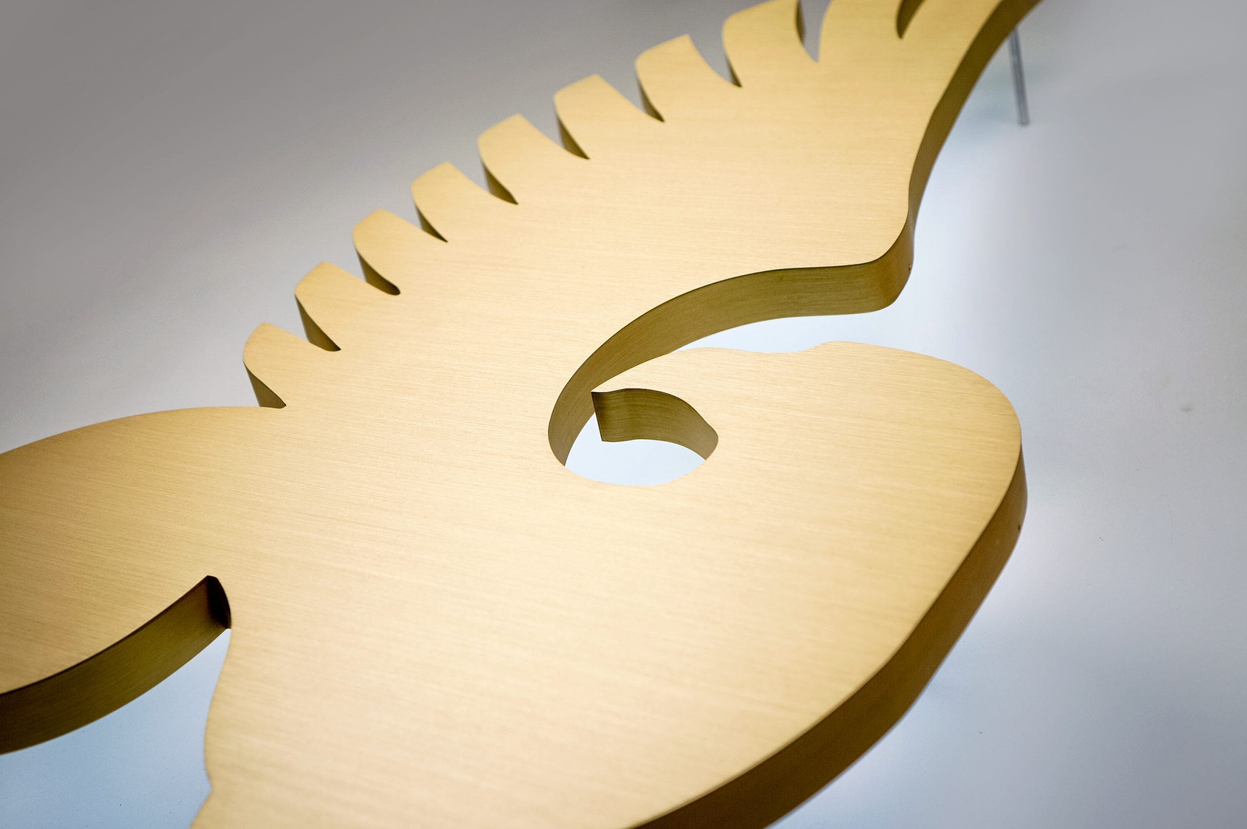 Illuminated brass griffin sign for Stack’s Bowers Galleries, an auction house in Santa Ana, California.