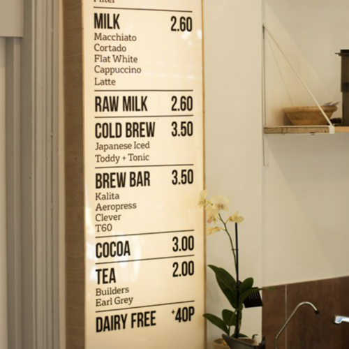 Wood lightbox menu for cafe, designed by Jake Howe.