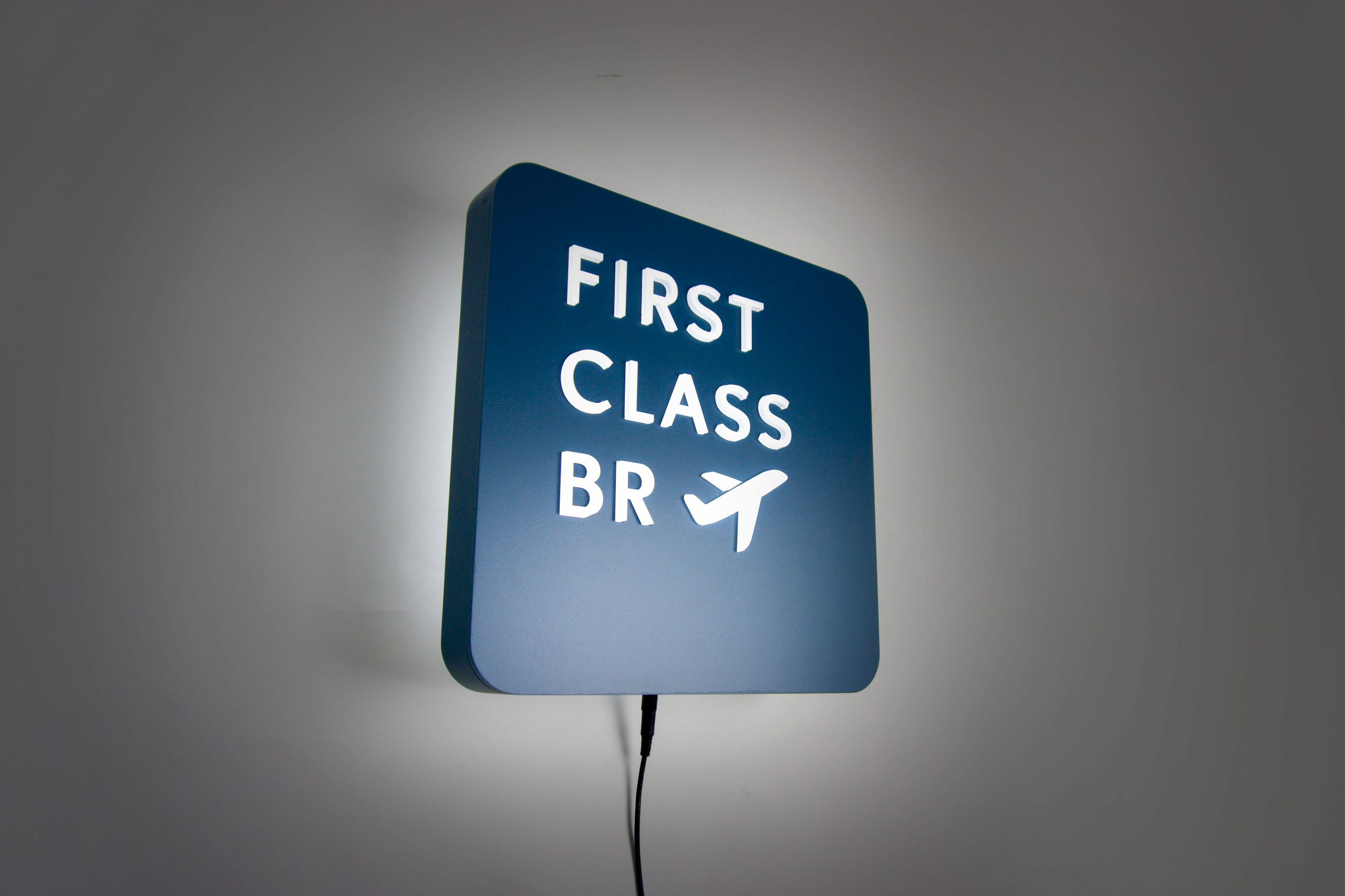 first-class-illuminated-left