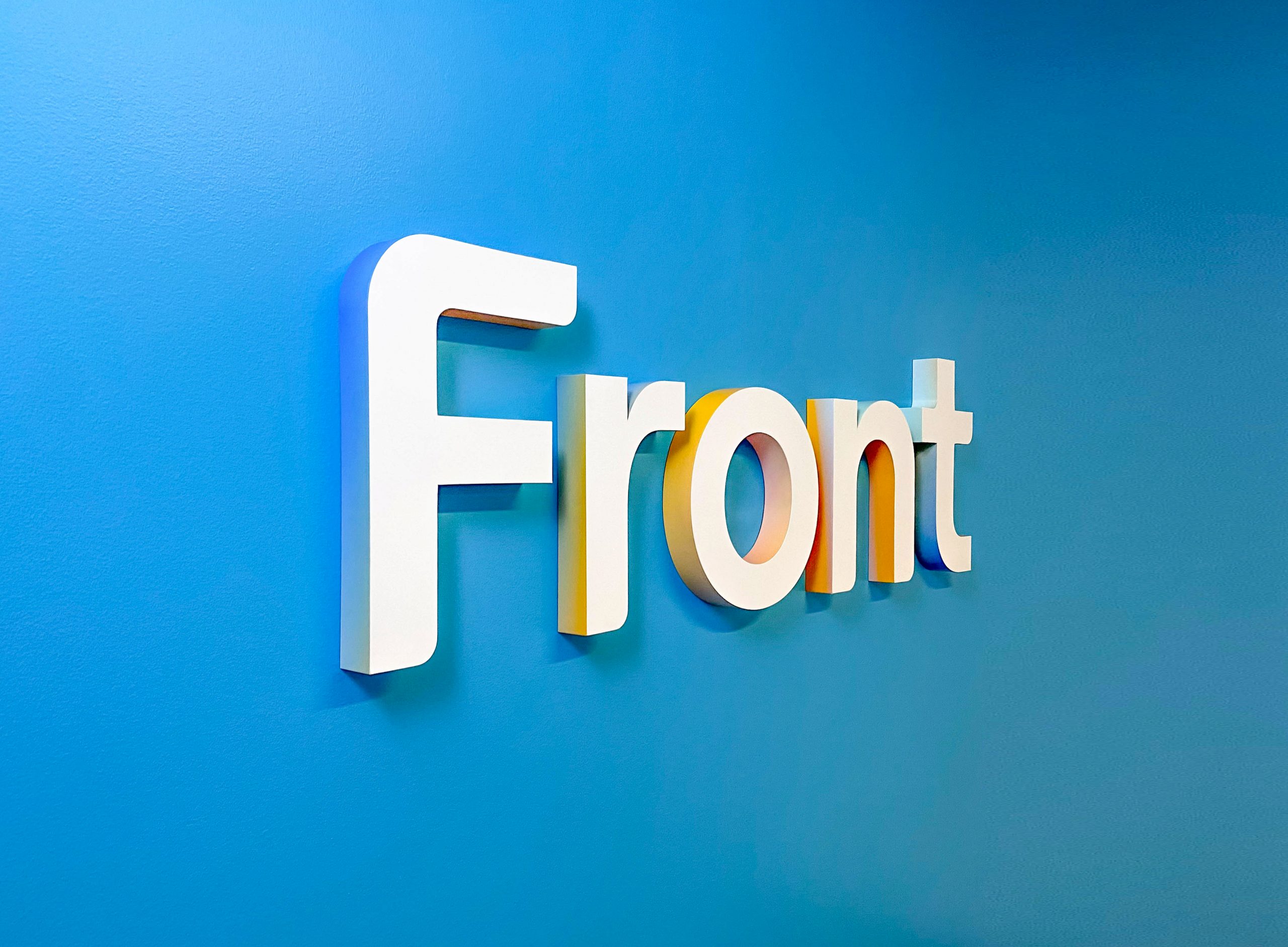 front-app-gradient-edge-sign-painted-wall
