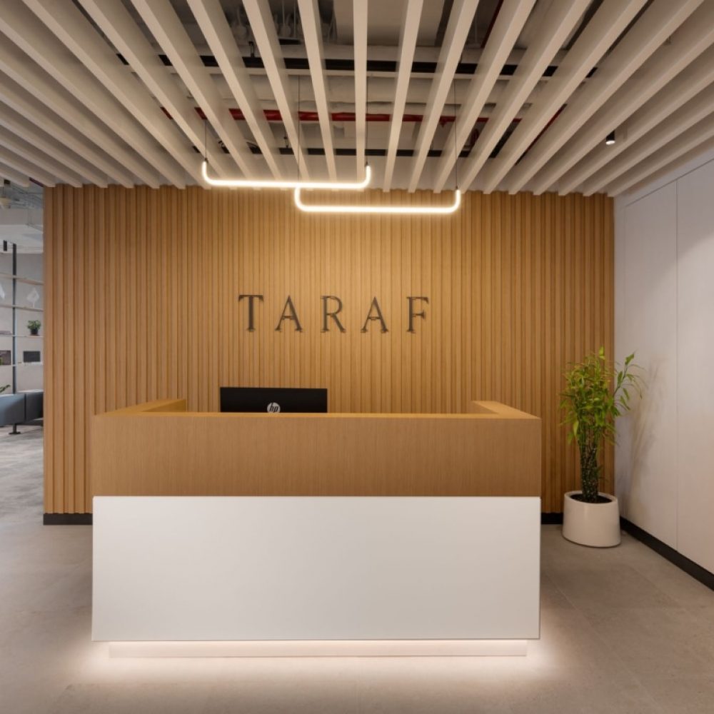 Minimalist serif letters on slat wood wall at the reception area of Taraf, a boutique property developer and asset manager based in the UAE. (Photo: Yamini Krishna Photography)