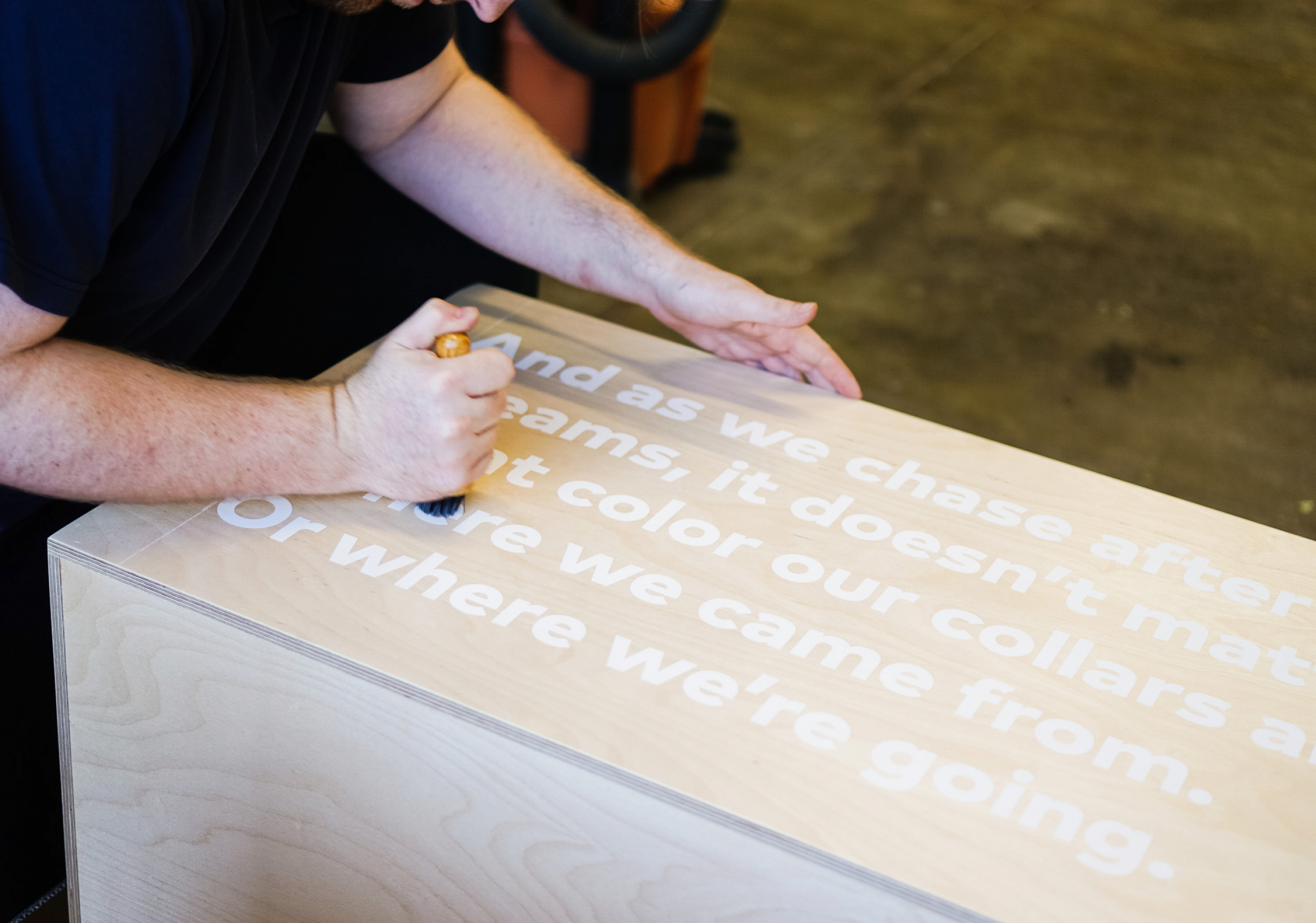 thumbtack manifesto sign - white matte vinyl on wood