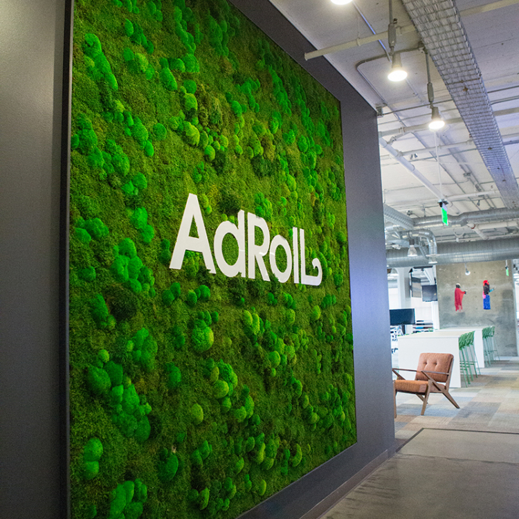 Moss wall with white logo at AdRoll