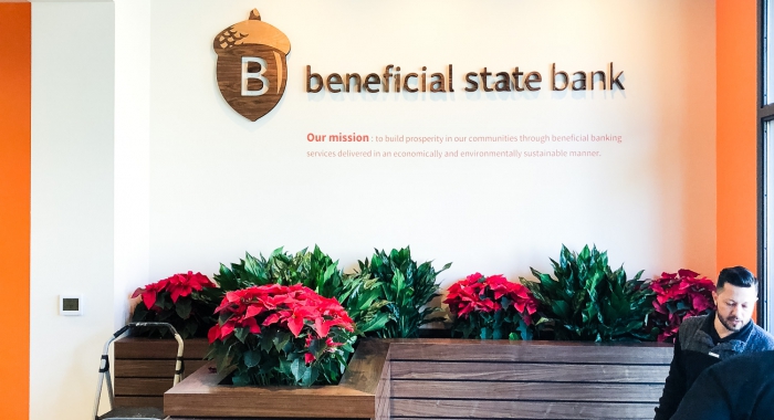 Wood sign for Beneficial State Bank, an Oakland, California-based community development bank.