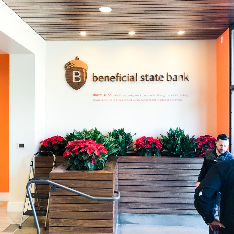 Wood sign for Beneficial State Bank, an Oakland, California-based community development bank.