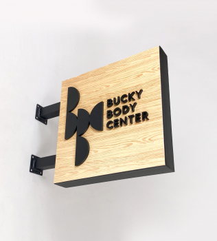 Bucky Body Center Blade Sign