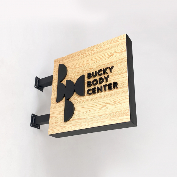 Bucky Body Center Blade Sign