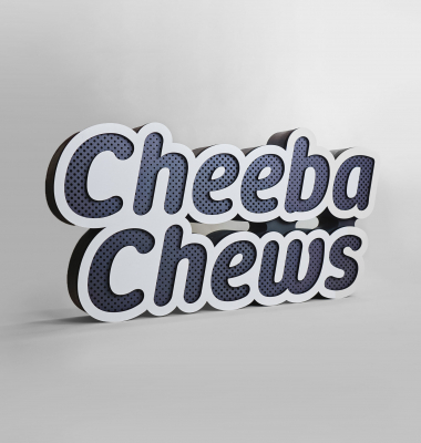 Dimensional large grey and white freestanding tradeshow floor sign for Cheeba Chews, makers of cannabis-infused edibles.